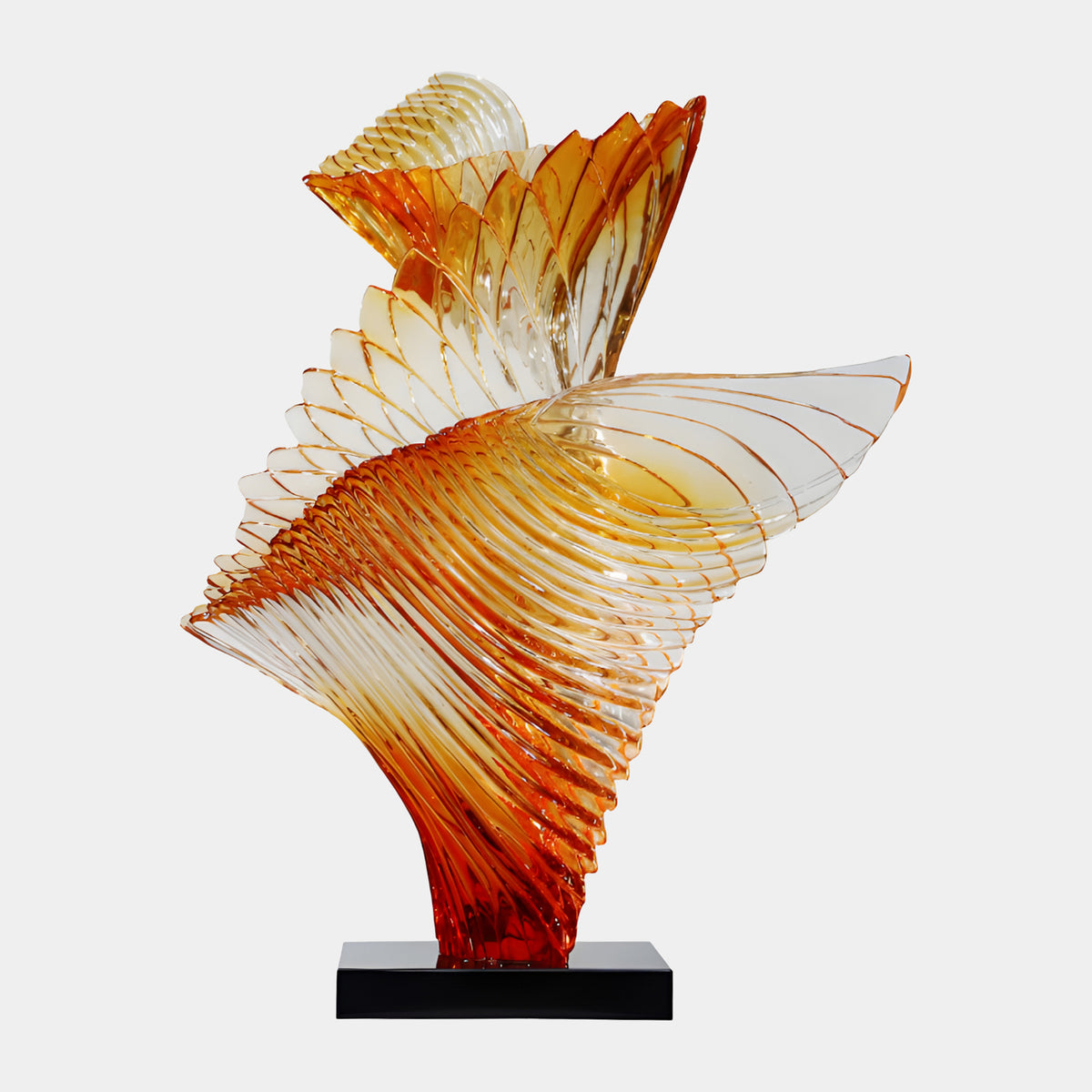 Amber Twin Ribbed Furl Cast Resin Sculpture, 110cm, with two ribbed amber-to-clear resin fins curling upward from a red-orange base, on a black stand against a plain white background.