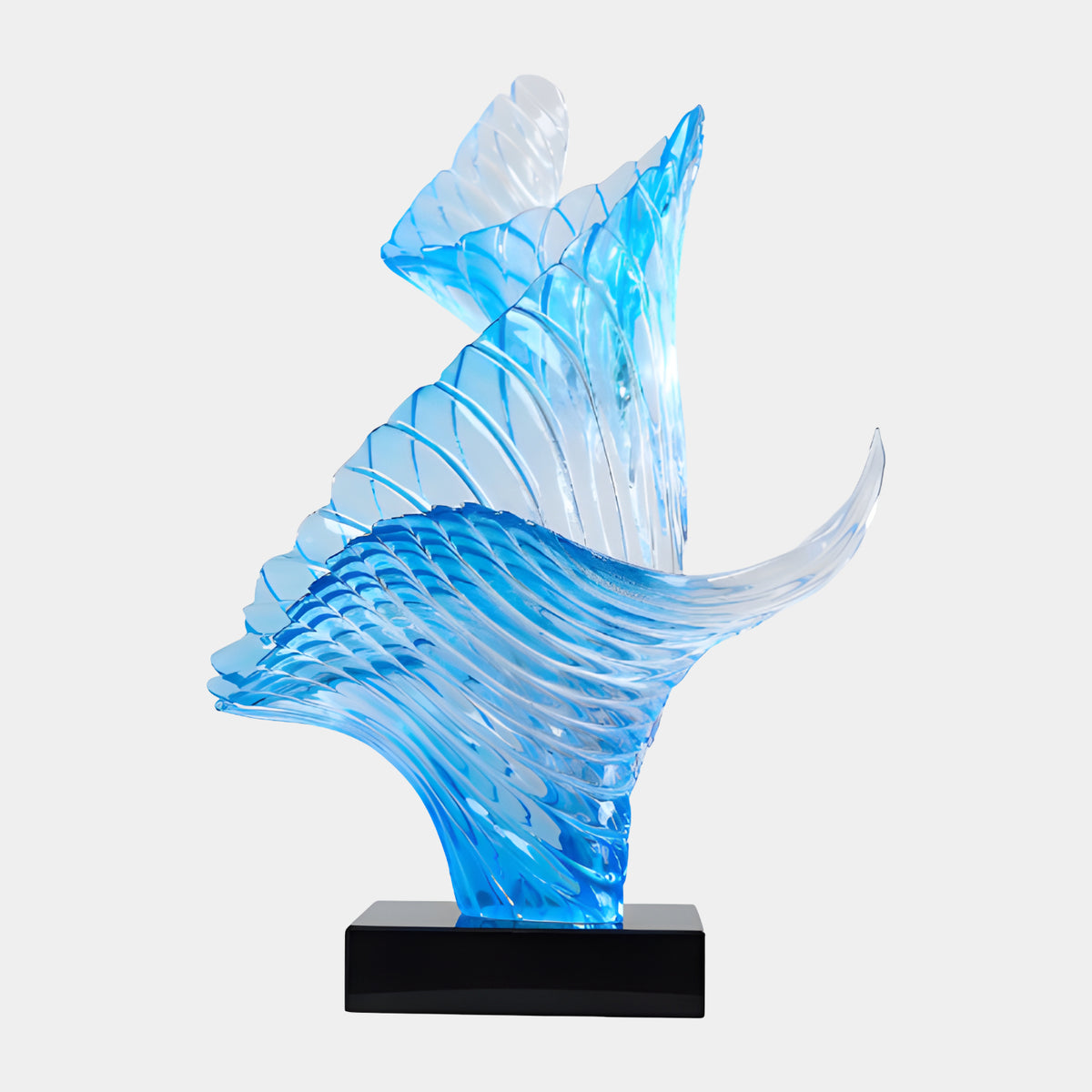 Blue Broad-Folded Ribbed Furl Resin Sculpture - 76cm by Giant Sculptures, two furled ribbed sheets in blue and clear resin curling upward from a black marble base, shown on a plain white background.