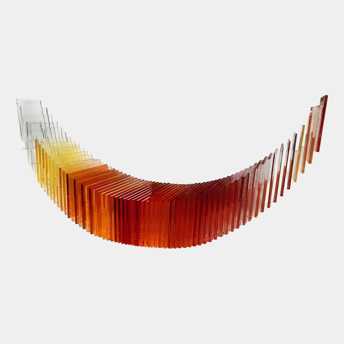 Red & Amber Layered Sheet Crescent Acrylic Sculpture, 260cm, upright acrylic sheets forming a curved crescent graded from clear to yellow, amber, orange and red, on a plain white background.