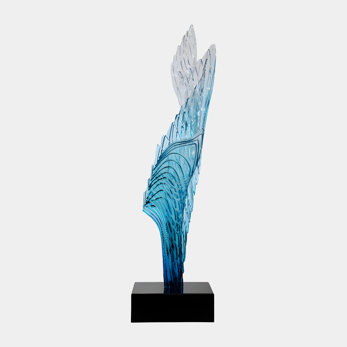 Blue Ribbed Blade & Crown Cast Resin Sculpture, 115cm, rising from a black marble base with ribbed, feather-like blue-to-clear resin blades, shown against a plain white background.