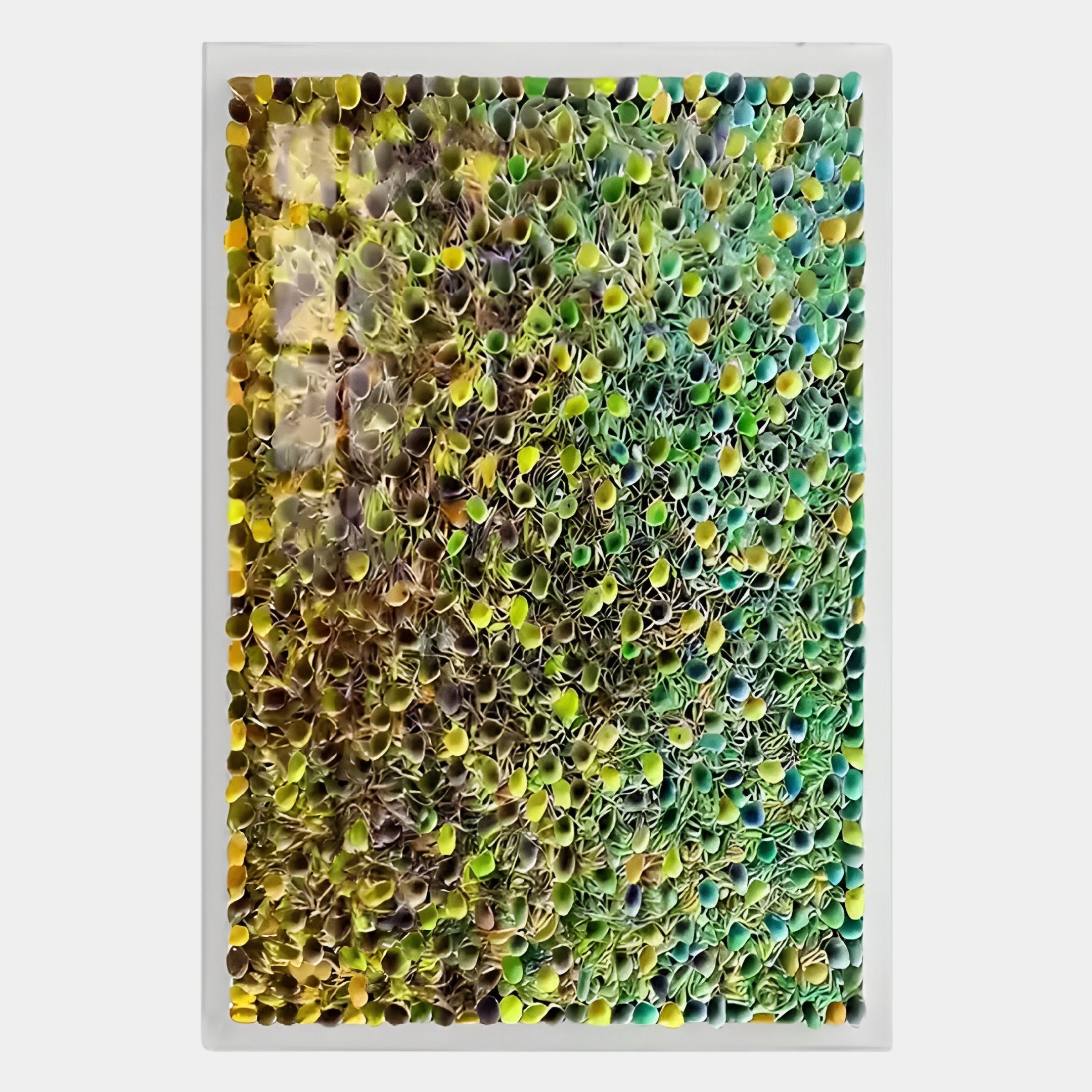 The Chromatica Vertical Vibrant Green Rolled Paper 3D Wall Art by Giant Sculptures features a rectangular frame filled with green, yellow, and blue paper tubes for a vibrant, textured look—perfect for adding a modern touch to any space.