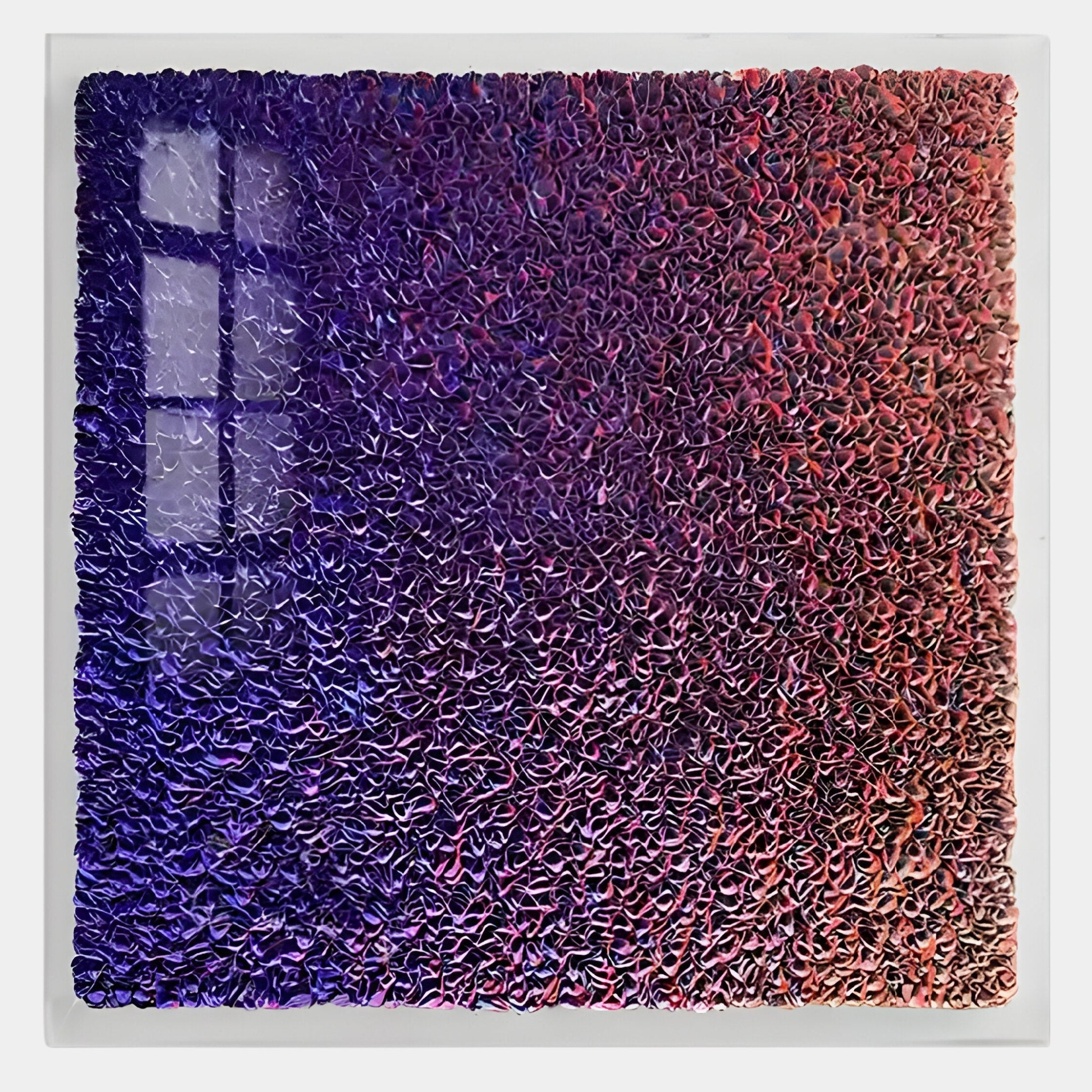 The Chromatica Square Vibrant Purple Gradient Paper 3D Wall Art by Giant Sculptures features dense, wavy, folded textures in purple, red, and blue. A windows rectangular reflection enhances its modern look.