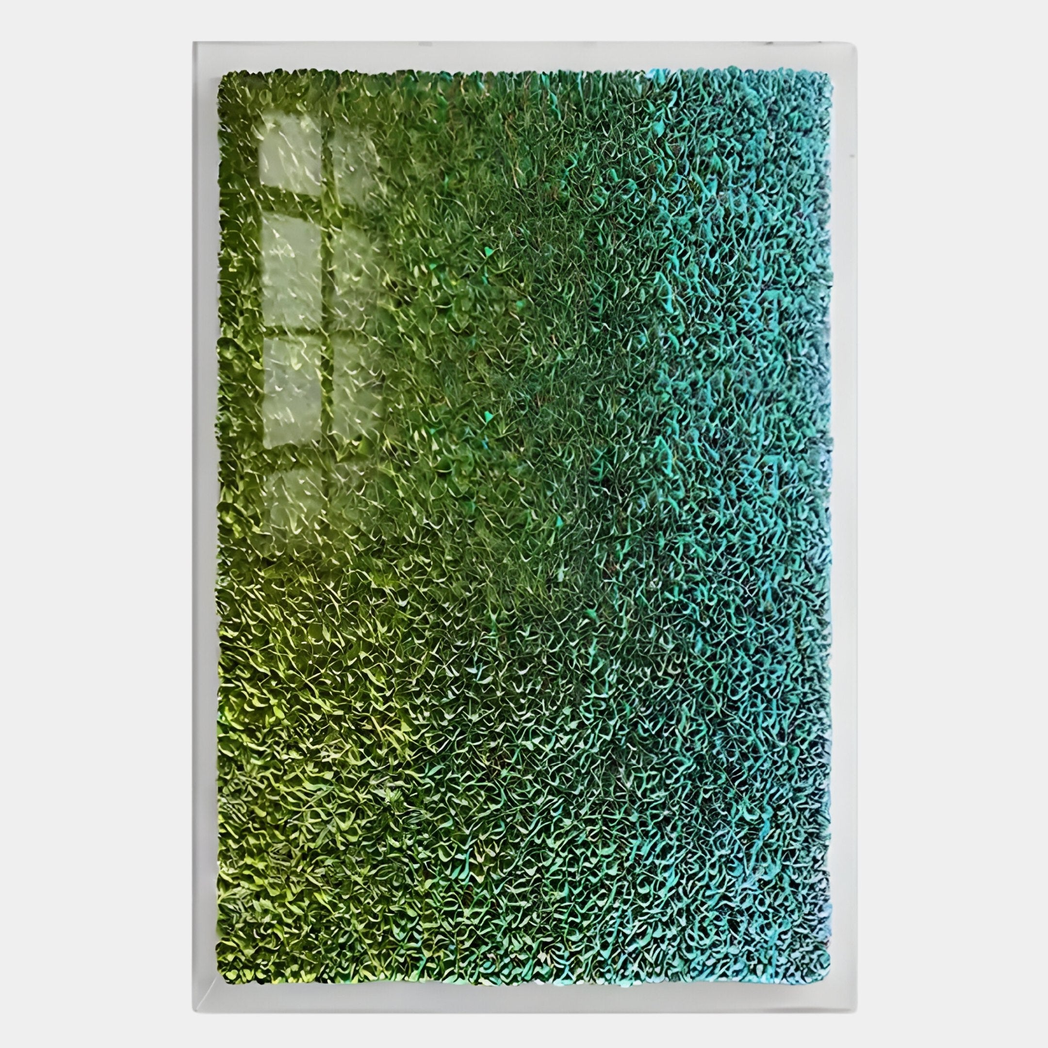 The Chromatica Vertical Lush Green Gradient Paper 3D Wall Art by Giant Sculptures features a textured rectangular surface with curled, leaf-like shapes in a lush green-to-turquoise gradient and light reflecting on the upper left side.