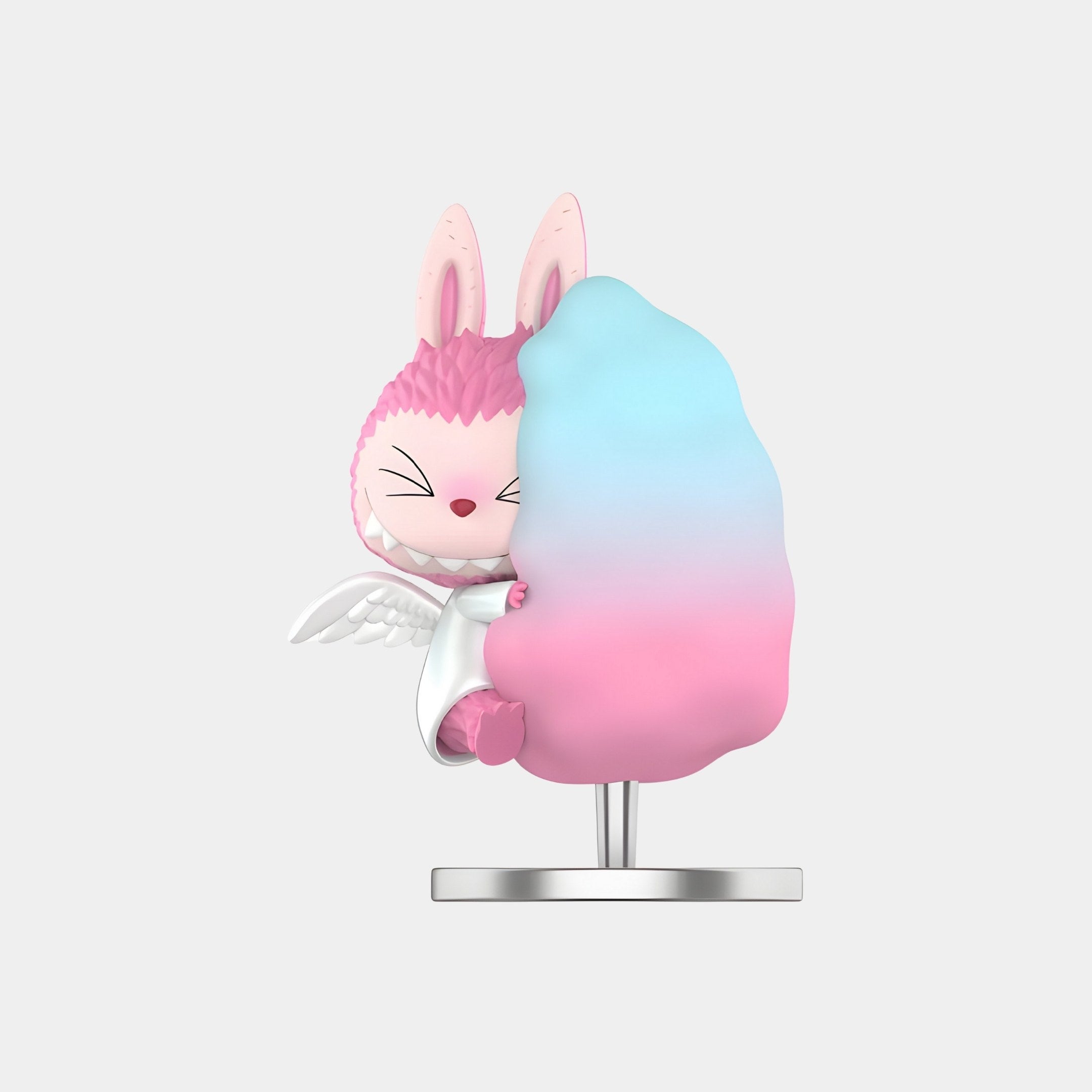 The Candy Floss Labubu Figure (7-10cm) by Giant Sculptures features a pink and white winged bunny hugging pastel blue and pink cotton candy, standing on a silver base—a delightful collectible for any fan.