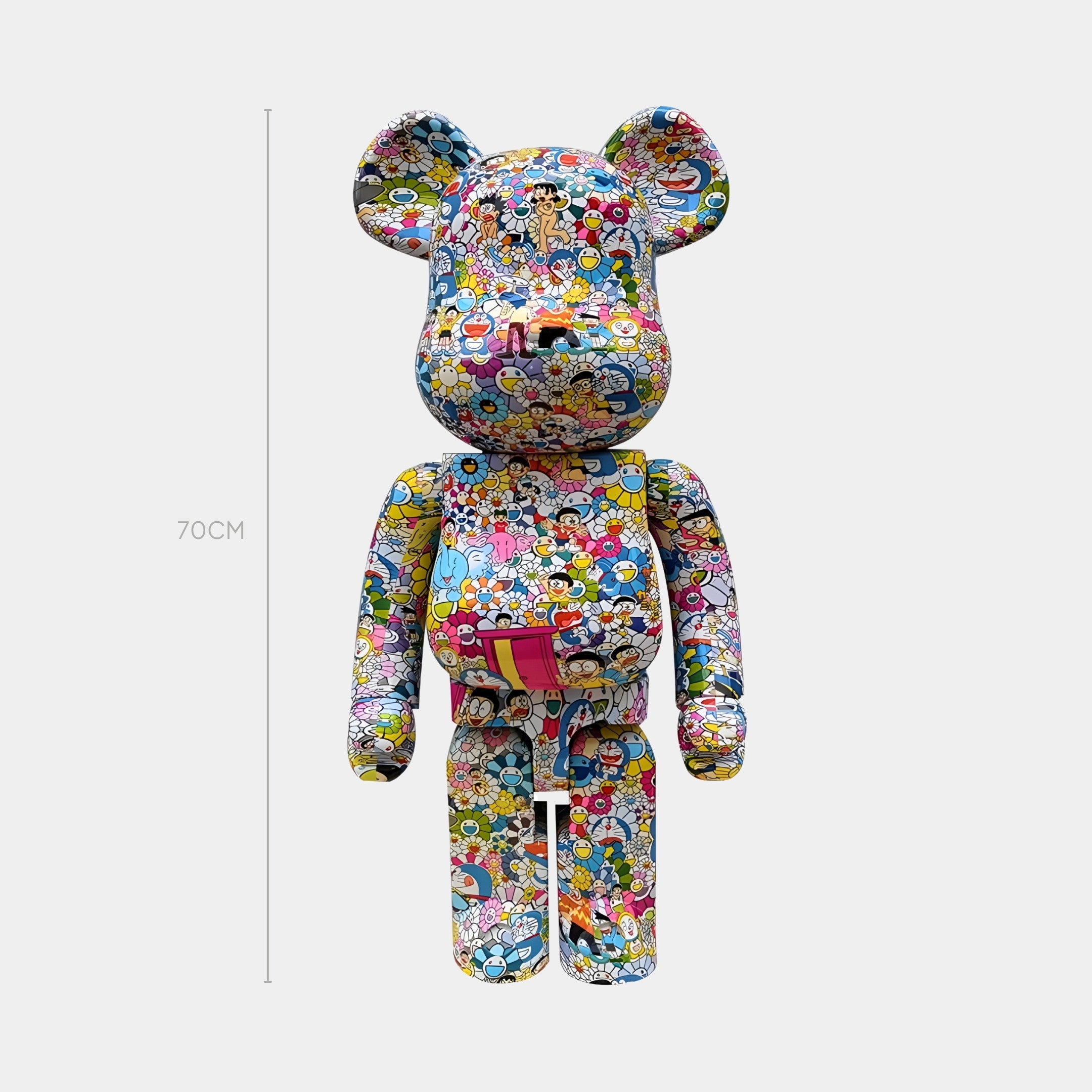 The Collage Carnival Bear Sculpture - 70cm by Giant Sculptures is a limited-edition figurine featuring a vibrant pop collage of cartoon characters, standing upright against a neutral background.