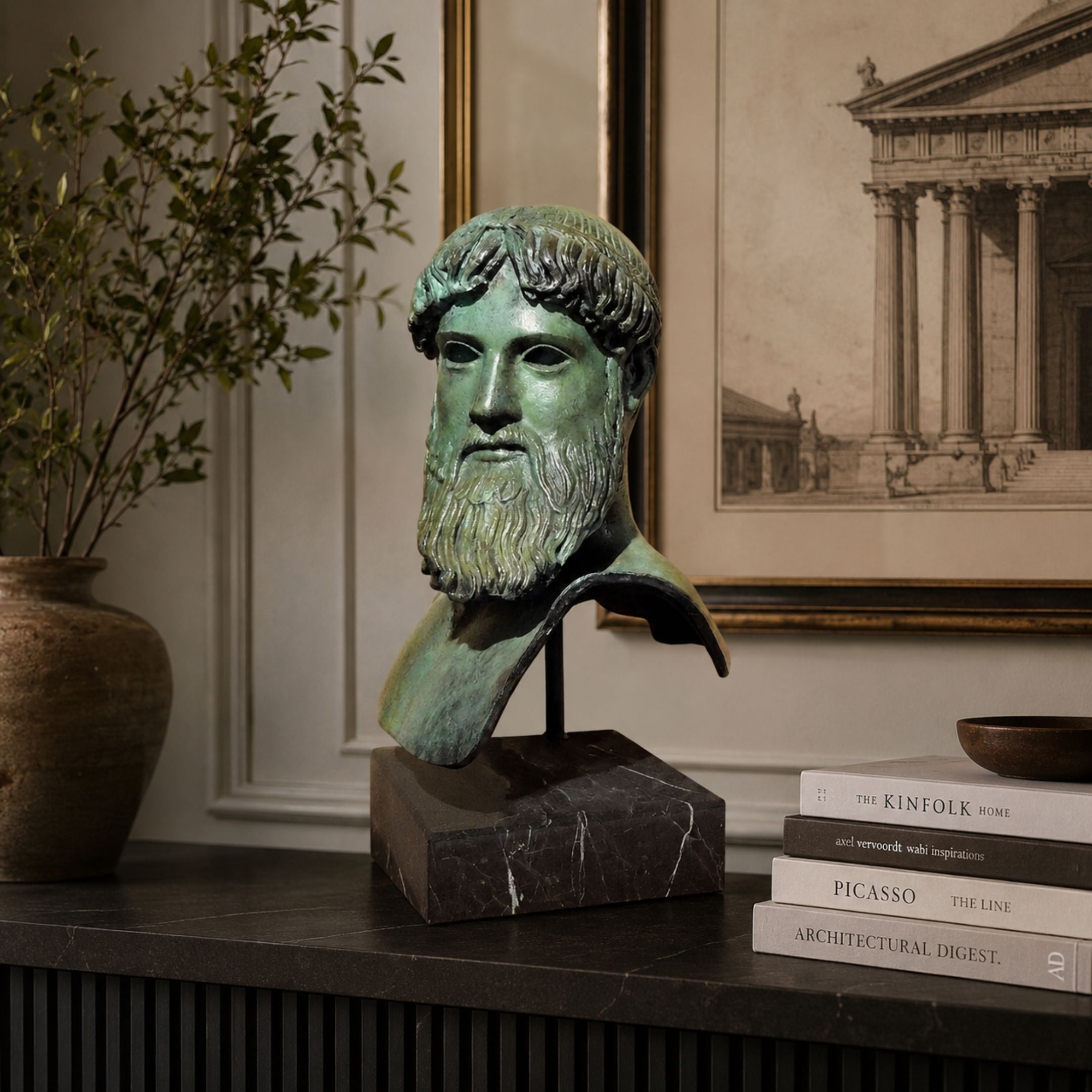 Classical Bearded Male Bust Bronze Bust, 65cm, with verdigris patina on a marble plinth, displayed on a console table beside books and framed art.