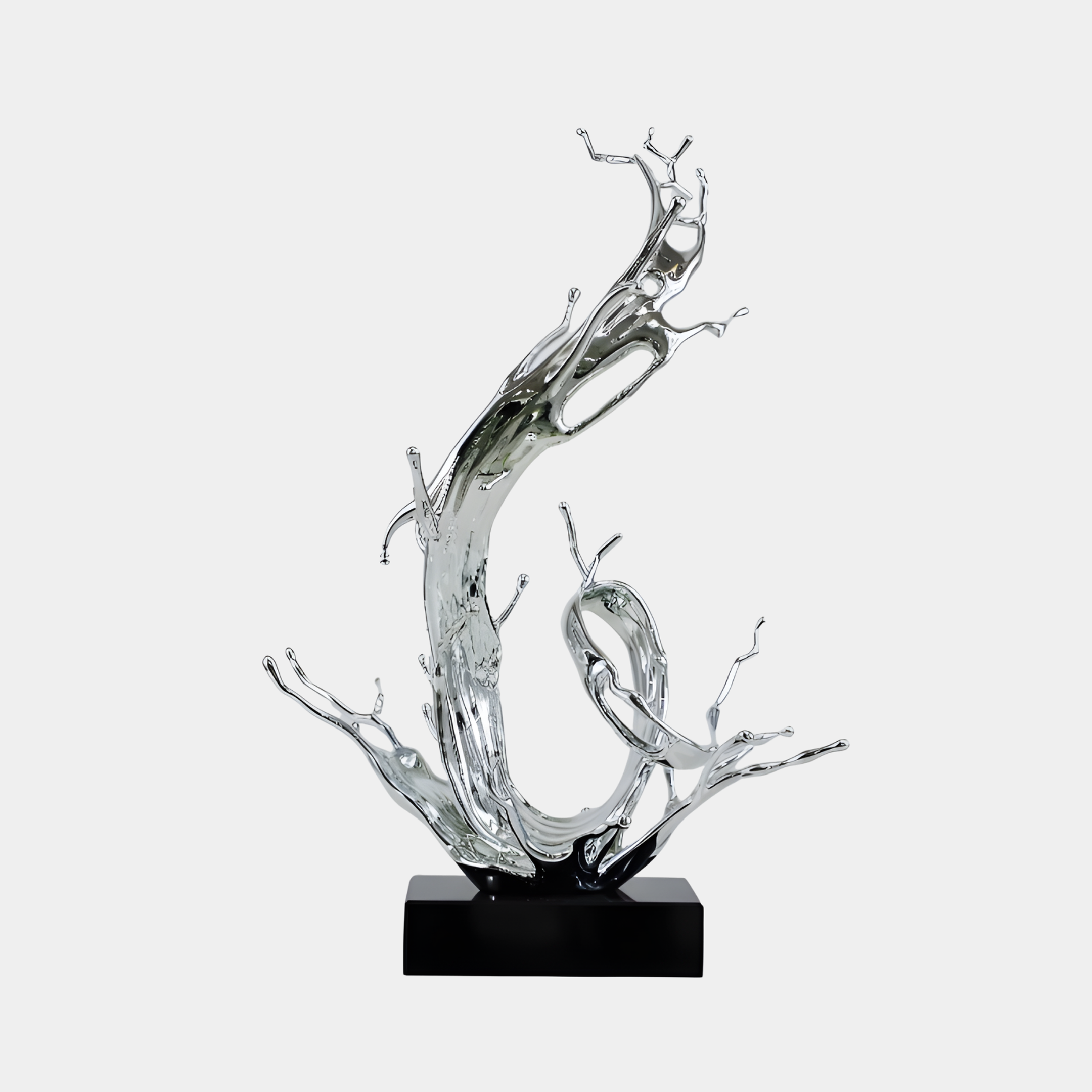 Silver Abstract Water Splash Sculpture by Giant Sculptures, mirror-chrome resin tendrils curling upward on a black rectangular base against a plain light background.