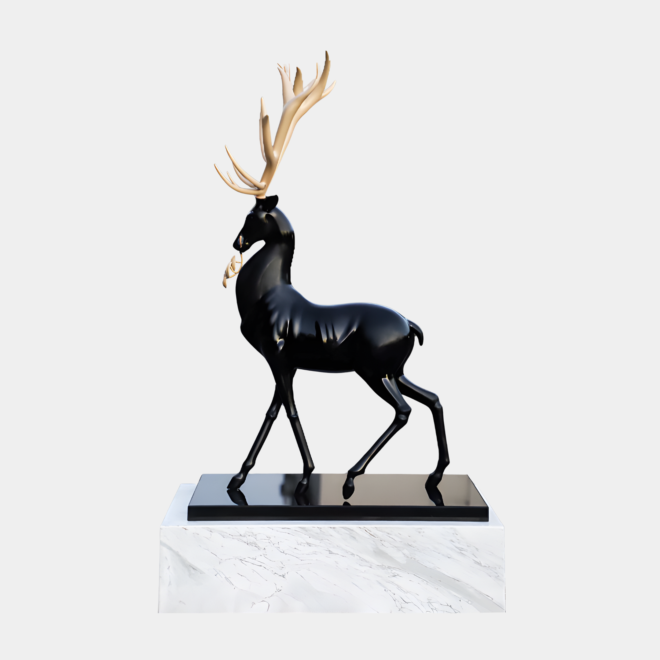 Giant Sculptures Black & Gold Standing Deer Sculpture in mid-stride, glossy black body with golden branching antlers, on a white marble plinth against a plain background.