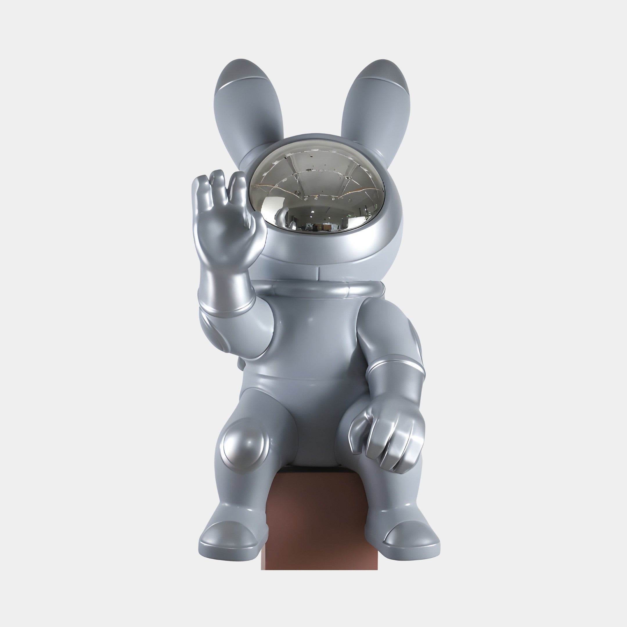 Giant Sculptures Silver Astronaut Rabbit Figure Sculpture 130cm in 3D-printed resin, seated waving with chrome domed visor and tall ears, on a light background.