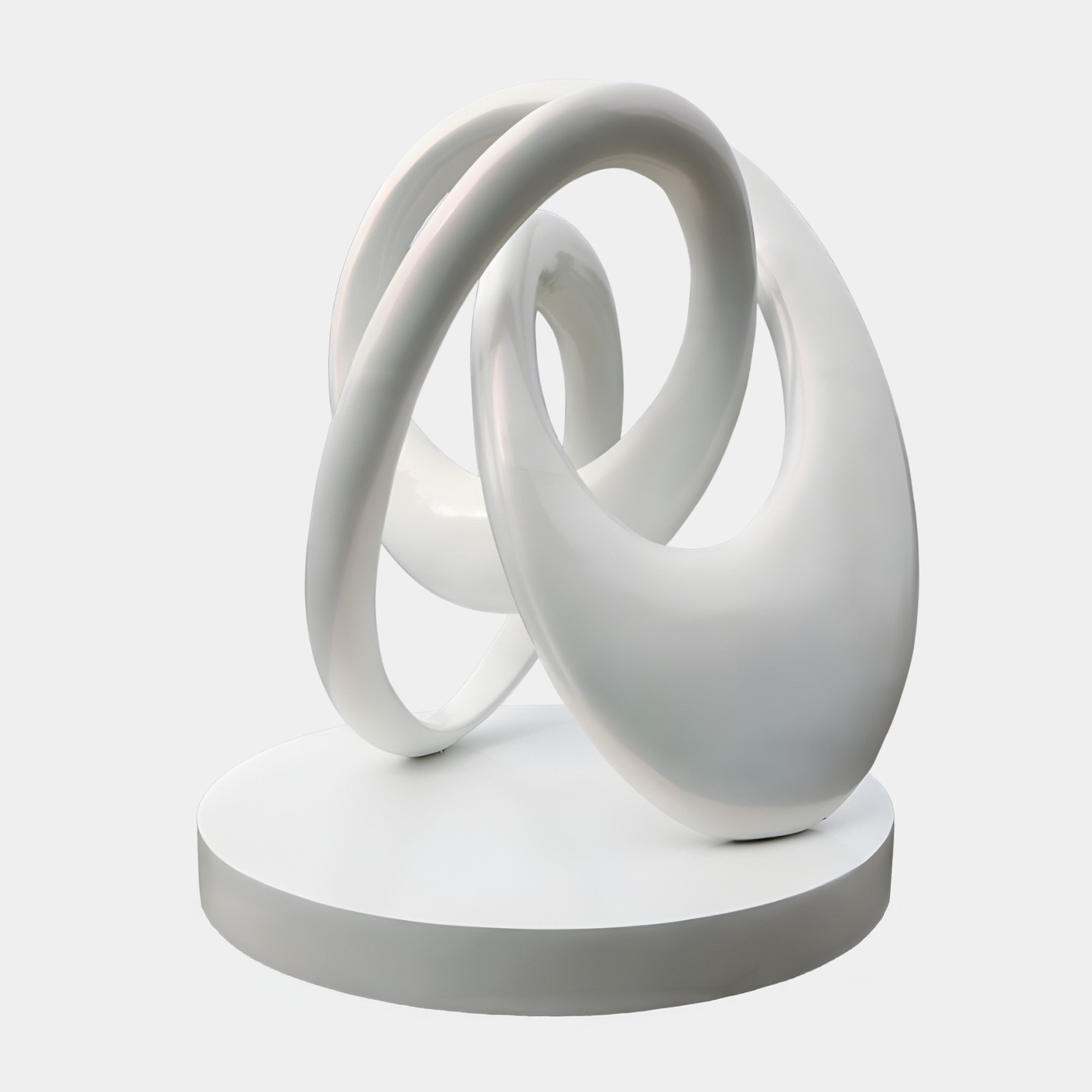 Giant Sculptures White Abstract Infinity Knot Sculpture in glossy fibreglass, with interlocking looped forms on a round white base against a plain background.