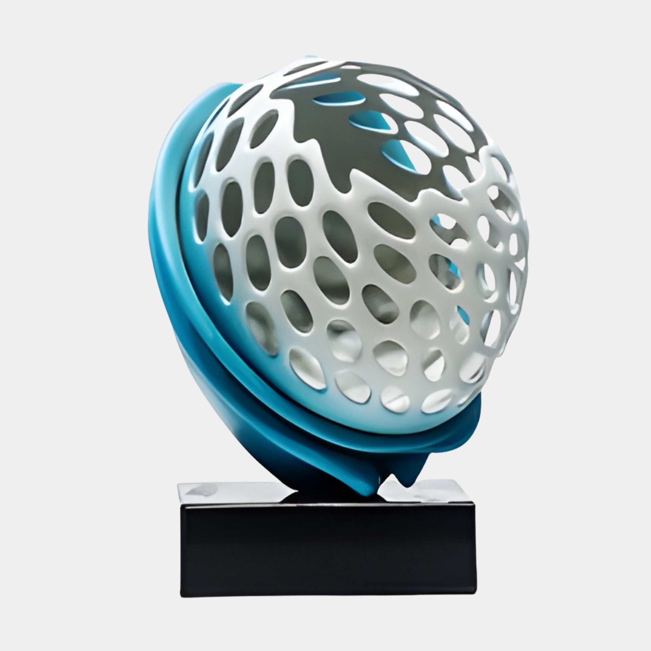 Teal and white perforated sphere sculpture by Giant Sculptures, its honeycomb orb cradled by a teal swirl on a black base, shown on a plain background.
