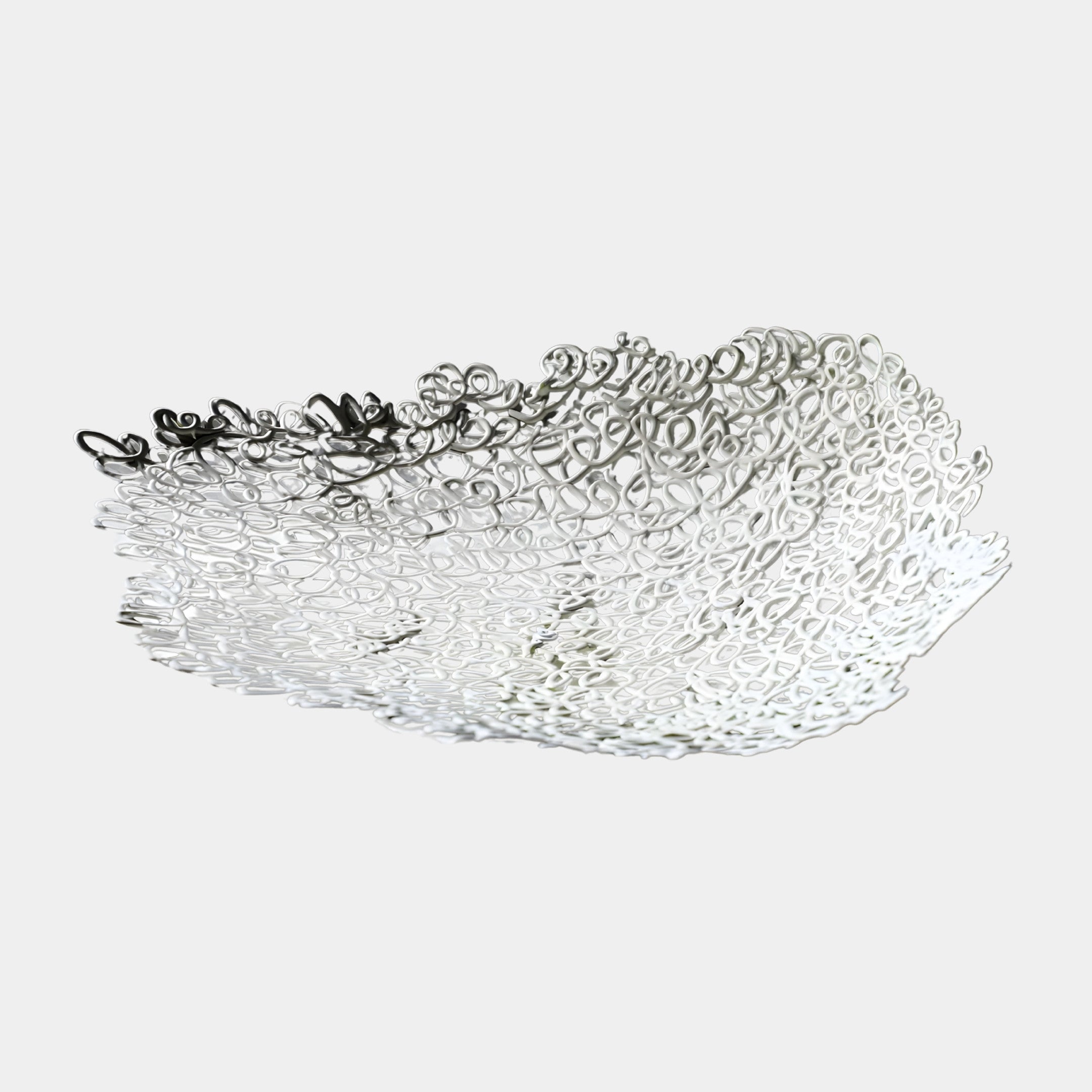 Giant Sculptures Silver Abstract Wire Filigree Leaf Tray in 50cm, a leaf-shaped dish of swirling silver wire mesh, shown on a plain light background.
