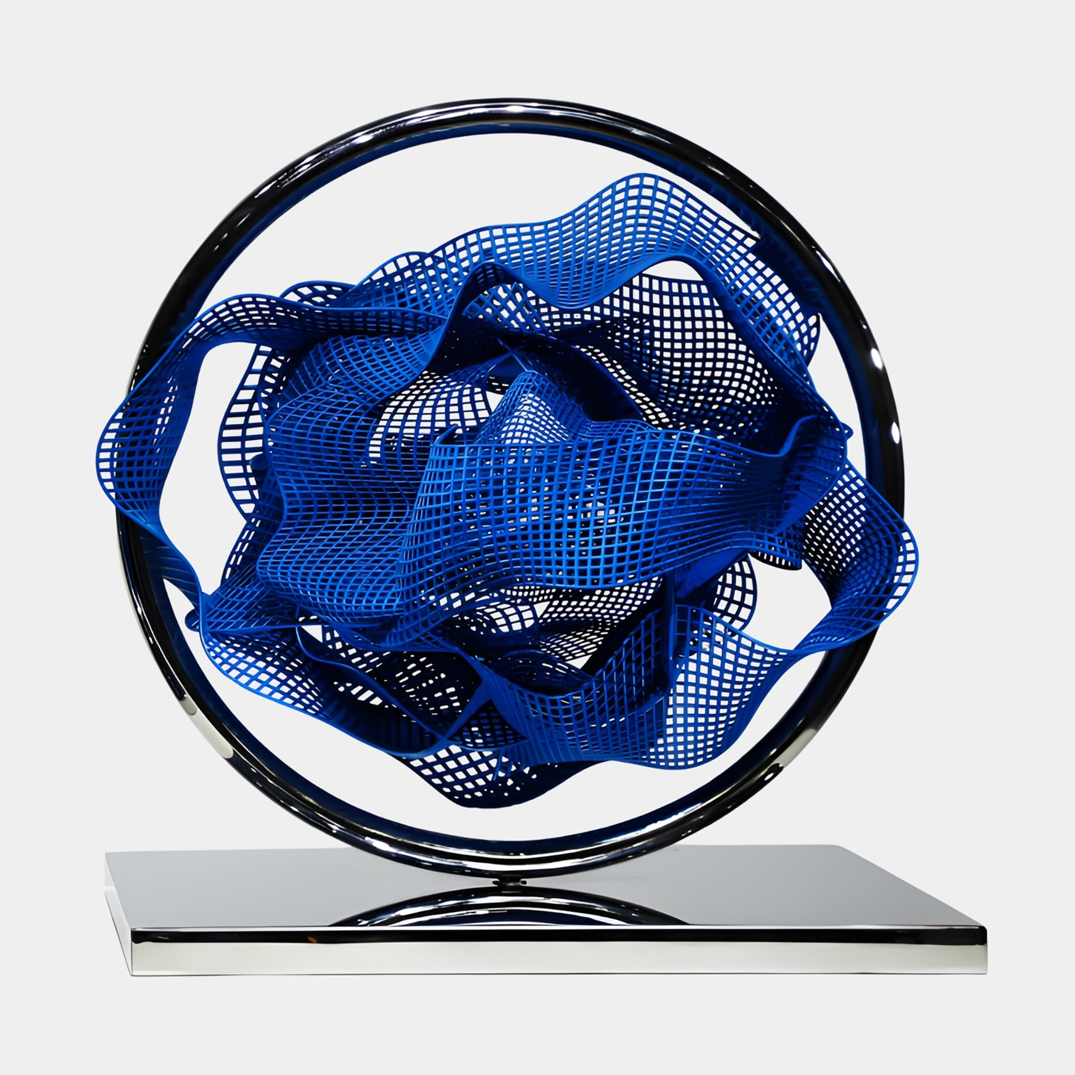 Giant Sculptures Blue Perforated Abstract Form in Ring Sculpture, 59cm, featuring a folded blue mesh ribbon inside a polished chrome ring on a mirrored base.
