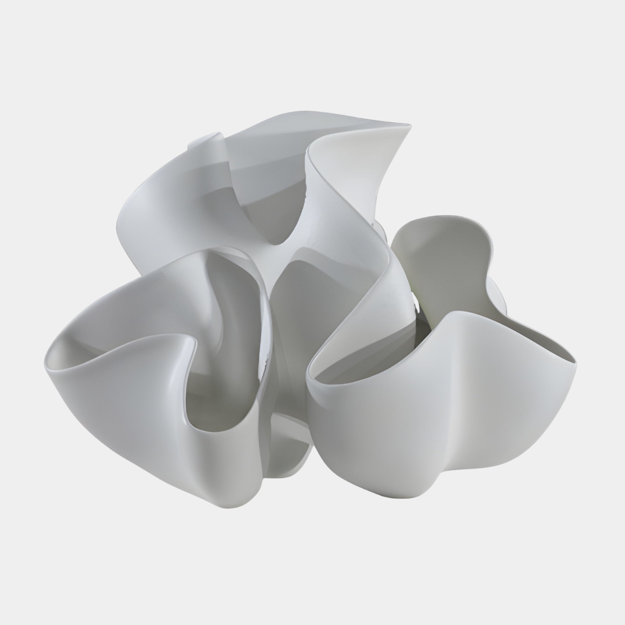 Giant Sculptures' White Abstract Organic Bloom Sculpture in glossy 3D-printed resin, with furled petal-like folds curling together, shown on a plain light background.