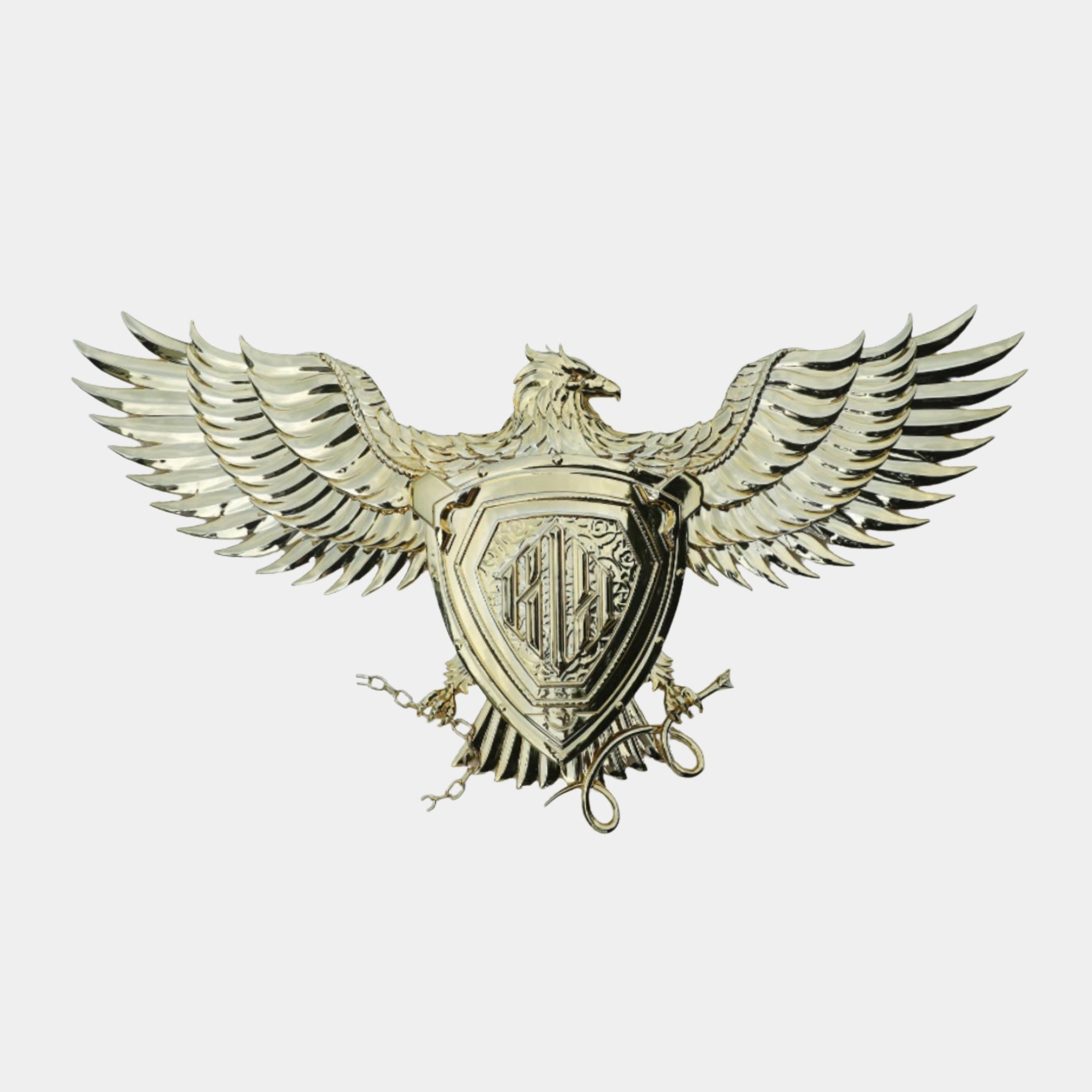 Giant Sculptures Gold Spread Eagle Wings Badge Sculpture 140cm, electroplated resin wall crest with outstretched feathered wings above a central shield, on grey.