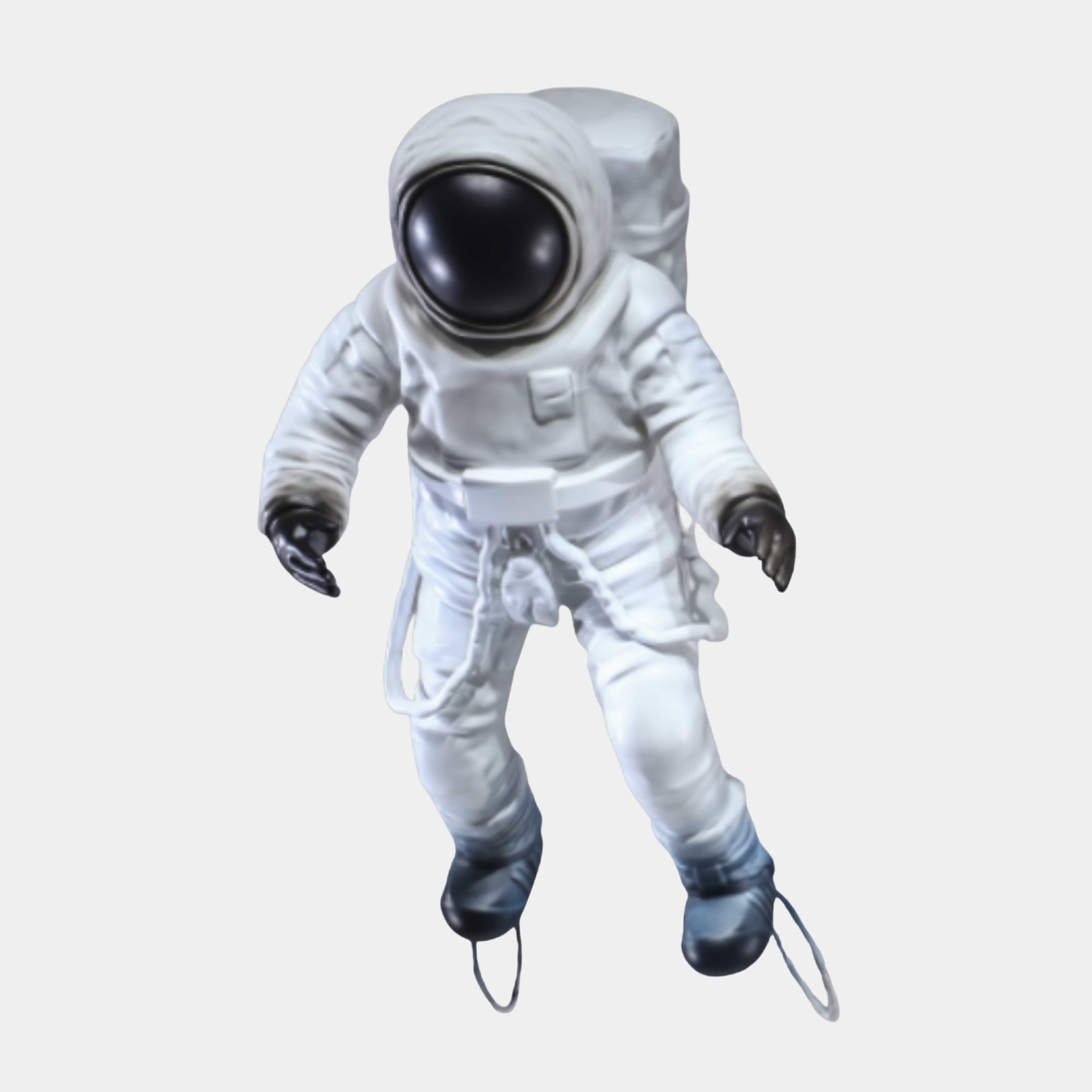 White Astronaut Figure Detailed Sculpture 54cm by Giant Sculptures in a 3D-printed resin spacesuit with glossy black visor, gloves and boots, shown floating against a plain background.