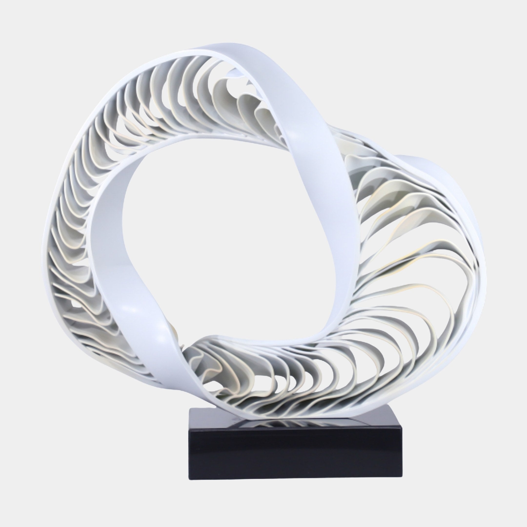 White Pleated Double Ring Sculpture by Giant Sculptures, 53cm 3D-printed resin form with layered wave-like blades on a black marble base against a plain background.