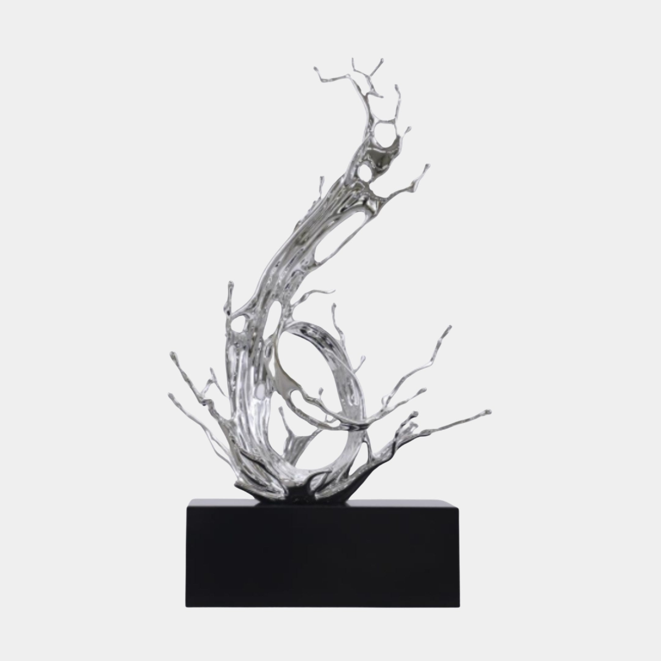 Silver Abstract Dead Tree Branch Sculpture by Giant Sculptures, with chrome-finish splash-like tendrils rising from a black base, shown against a plain background.