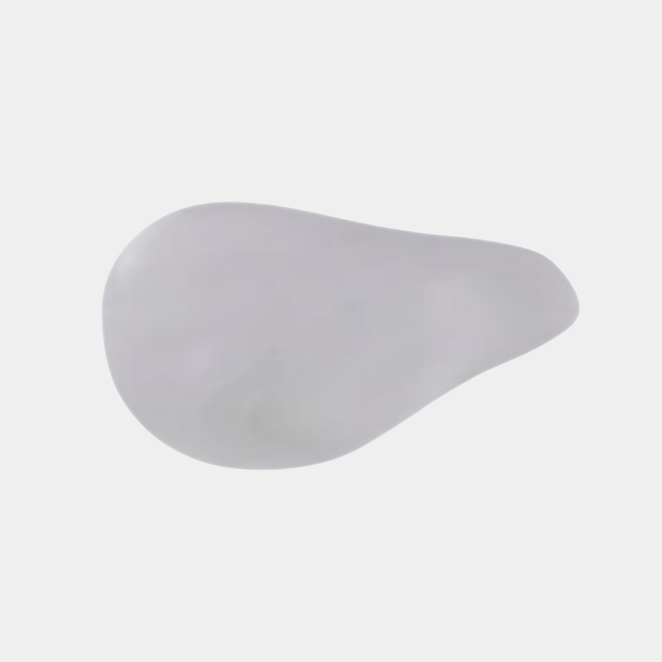 Top-down view of the Giant Sculptures Clear Frosted Glass Organic Form Sculpture, a smooth pebble-like resin piece in translucent grey on a plain background.