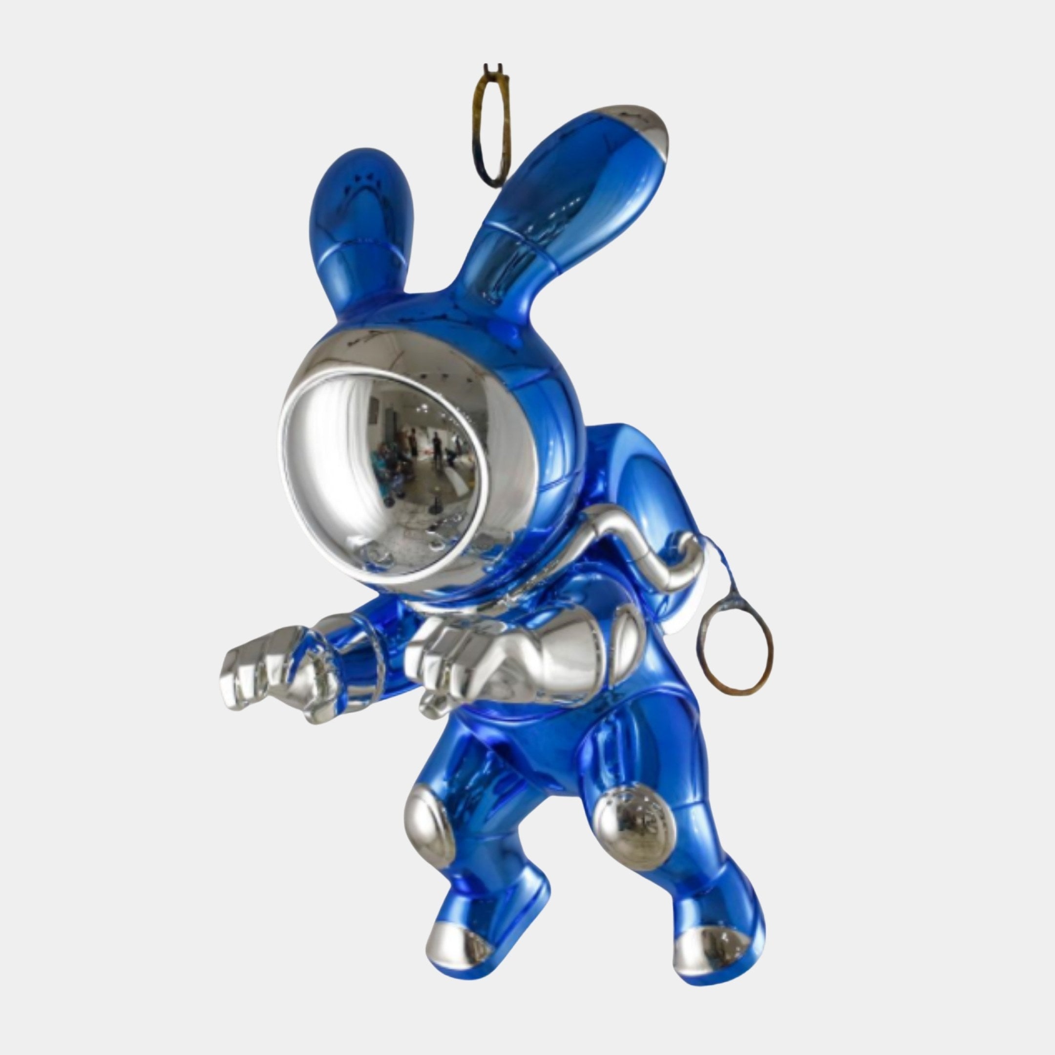 Blue Metallic Rabbit Astronaut Sculpture by Giant Sculptures in a mid-leap pose with chrome-silver visor, gloves, and boots, shown against a plain light background.