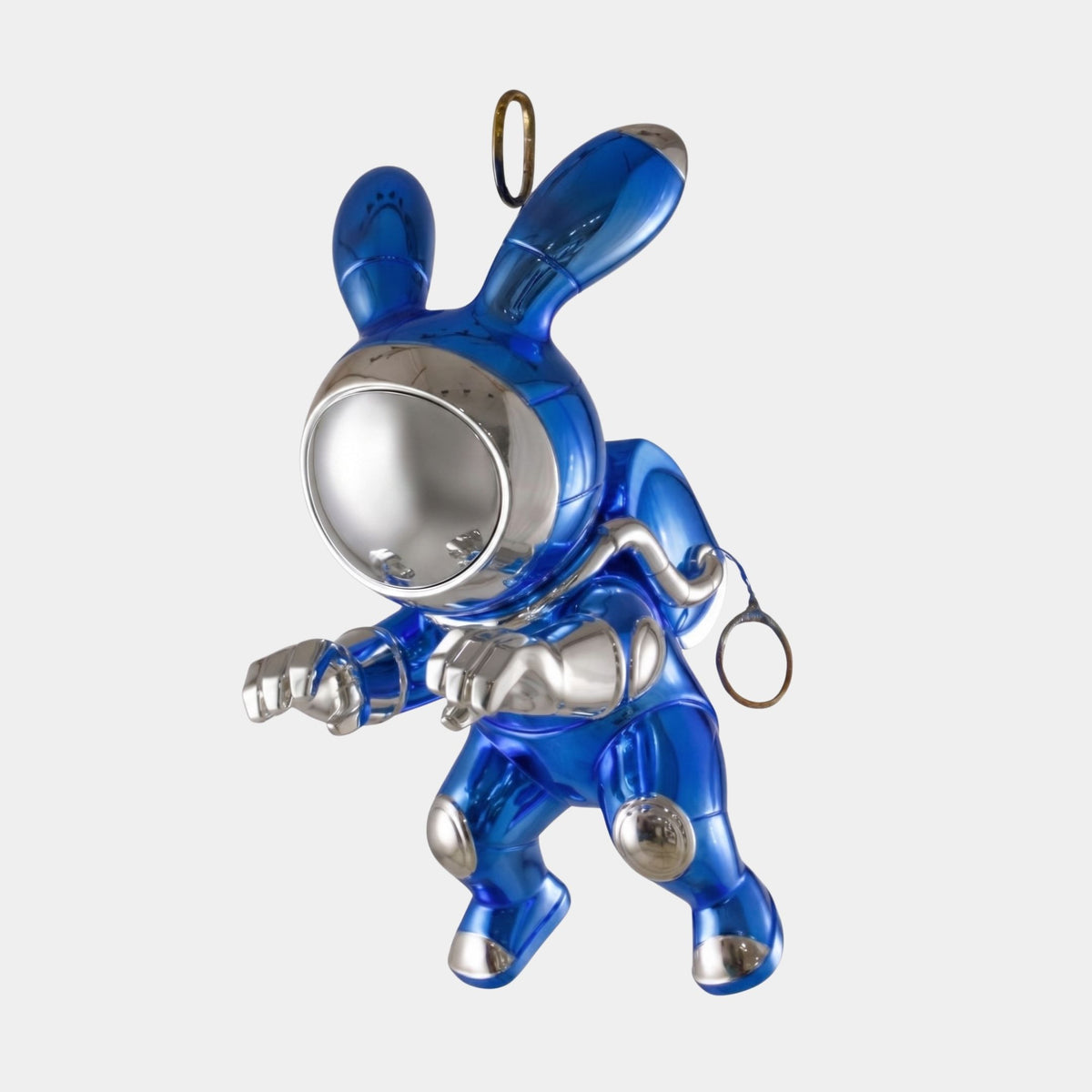 Blue Metallic Rabbit Astronaut Sculpture by Giant Sculptures in a mid-leap pose with chrome-silver visor, gloves, and boots, shown against a plain light background.