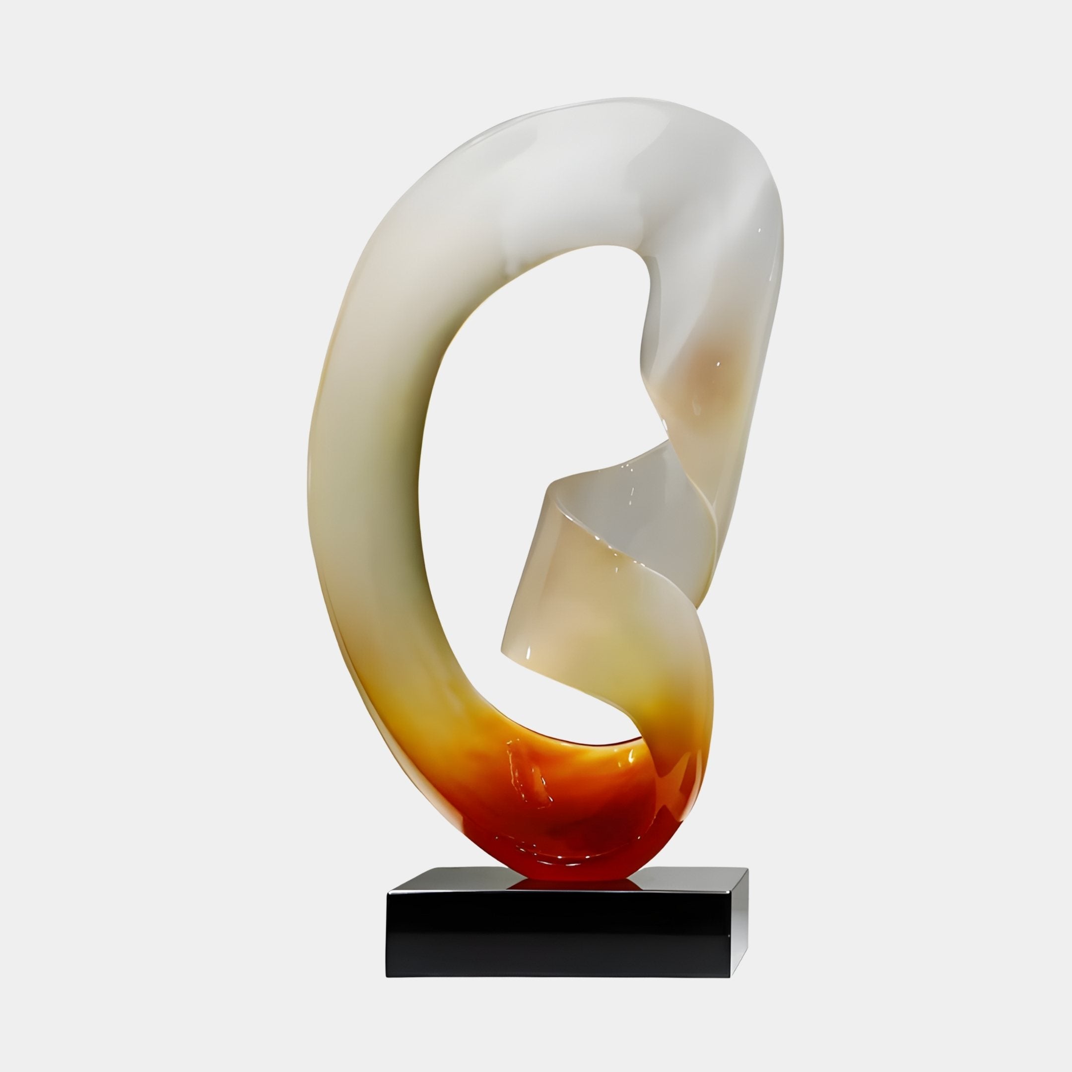 Infinite Loop Sunset Abstract Jade Sculpture by Giant Sculptures, a cream-to-amber ribbon loop with central fold on a black plinth, plain background.