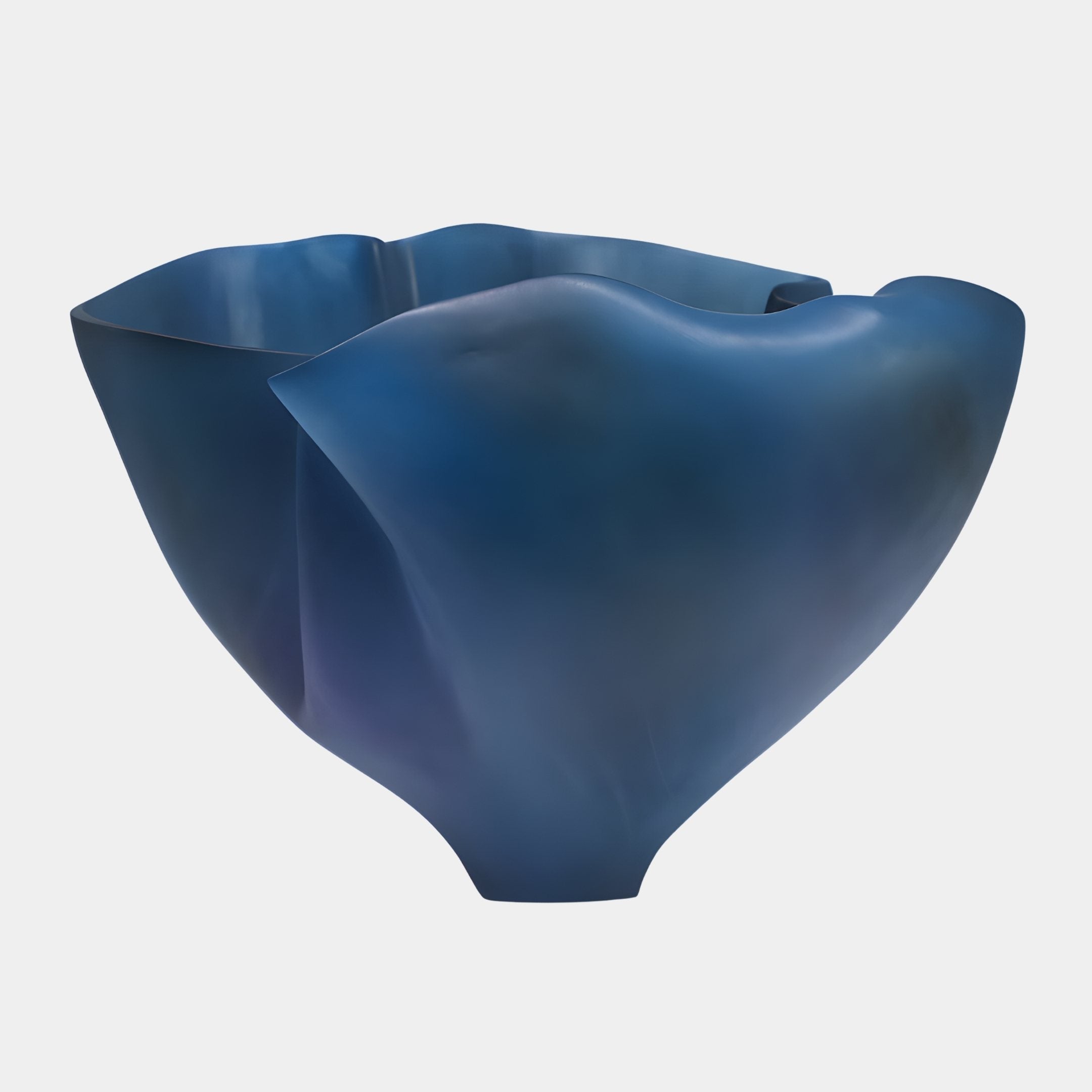 Ocean Petal Deep Blue Abstract Bowl by Giant Sculptures, a fluted petal-form resin bowl in cobalt-to-indigo gradient with a wavy rim, shown on a white background.