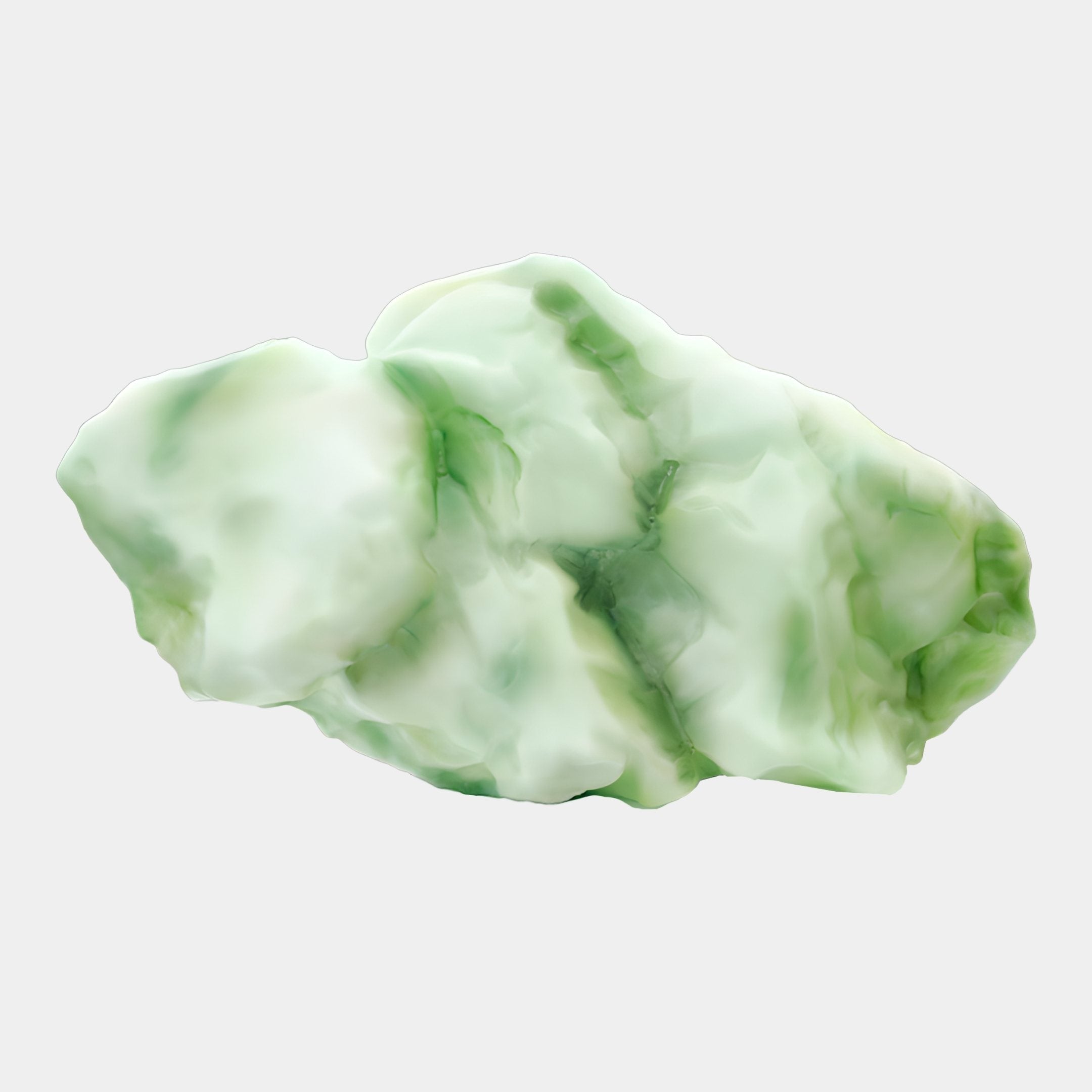Jade Stone Green Raw Abstract Sculpture by Giant Sculptures, an irregular boulder form in pale celadon with emerald veining, shown against a plain white background.