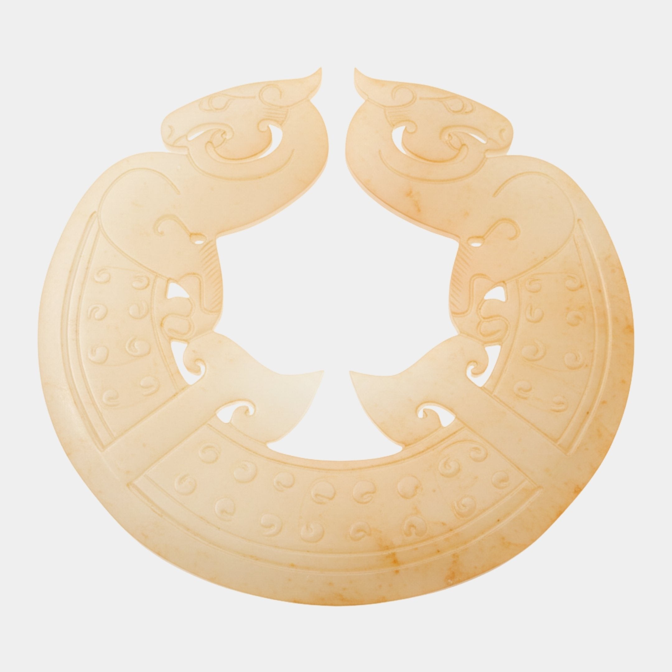 Twin Dragon Arc Ivory Carved Jade Ornament 140cm by Giant Sculptures, a circular cream jade disc with mirrored archaic dragons and scroll motifs on a white background.