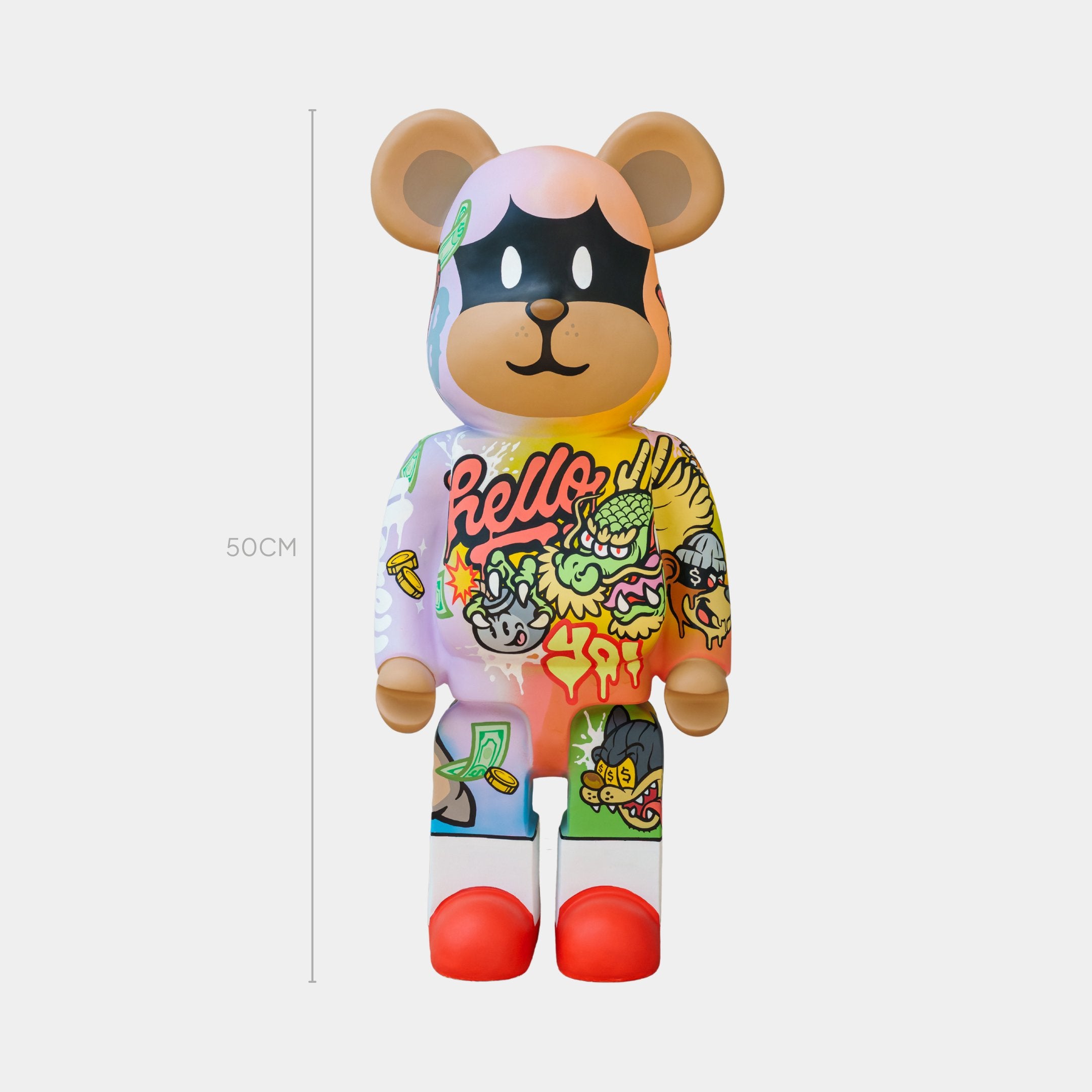 The 50cm Lucky Paws Bear Sculpture by Giant Sculptures, a limited edition artwork, features a masked bear face with colorful graffiti designs including Hello and abstract shapes, making it captivating and unique.