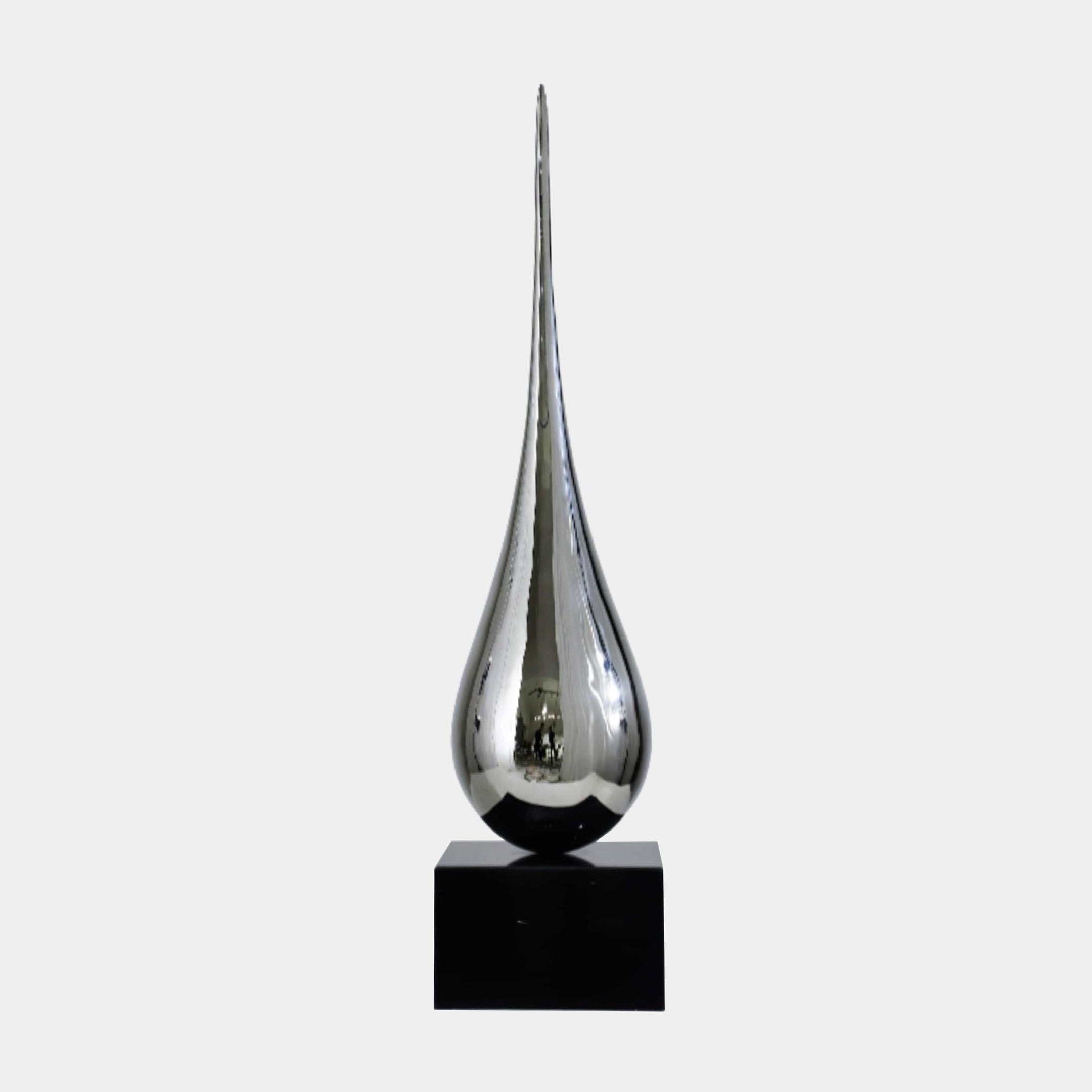 Silver Polished Teardrop Stainless Steel Sculpture, 105cm, mirror-finish teardrop form on black marble base, set against a plain light grey background.