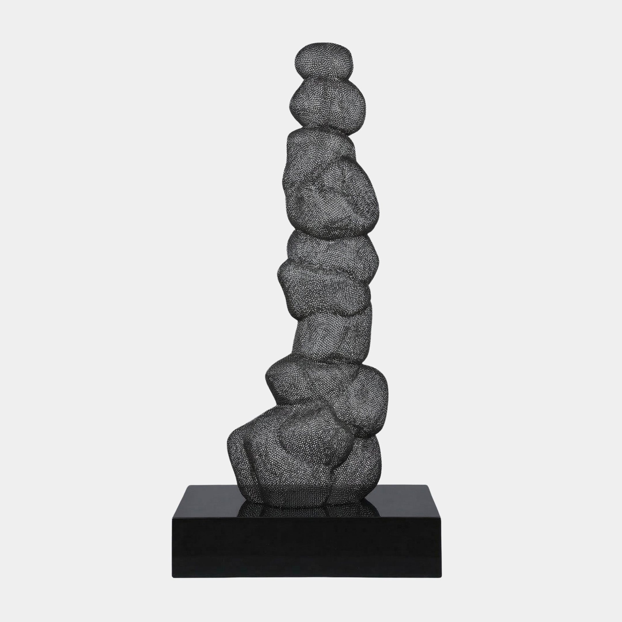 Grey Stone Stack Stainless Steel Sculpture, 180cm, textured metal stones balanced in a tall stack on a black rectangular base, plain light grey background.