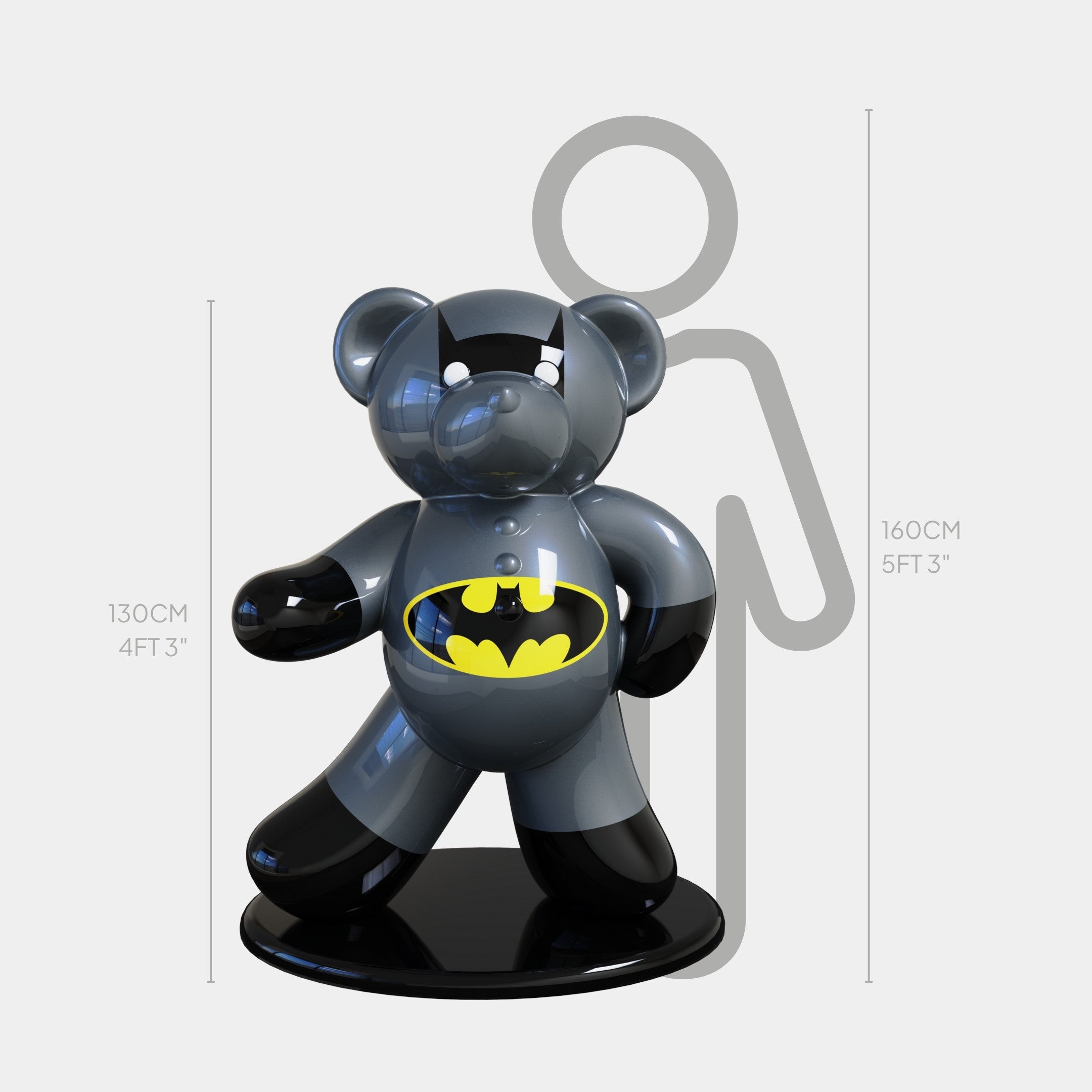 The Gacko Batman Bear Sculpture - 130cm by Giant Sculptures stands on a black base next to a 160cm human outline for scale. This shiny Pop Art sculpture is 130cm (4 ft 3 in) tall.