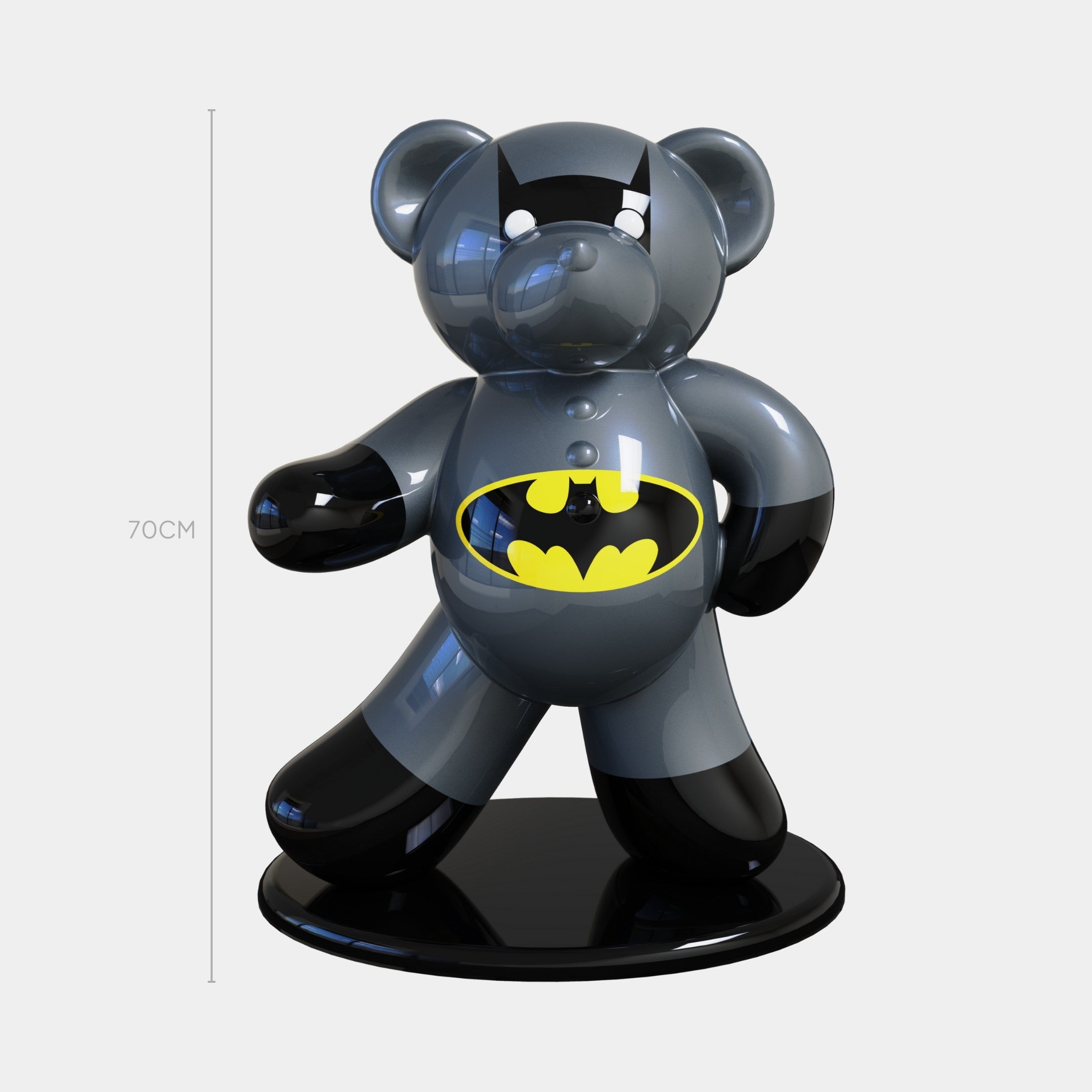 The Gacko Batman Bear Sculpture - 70cm by Giant Sculptures features a shiny bear in a Batman mask and logo, painted black and grey, standing on a round black base. A measurement line beside it highlights its impressive 70 cm height.