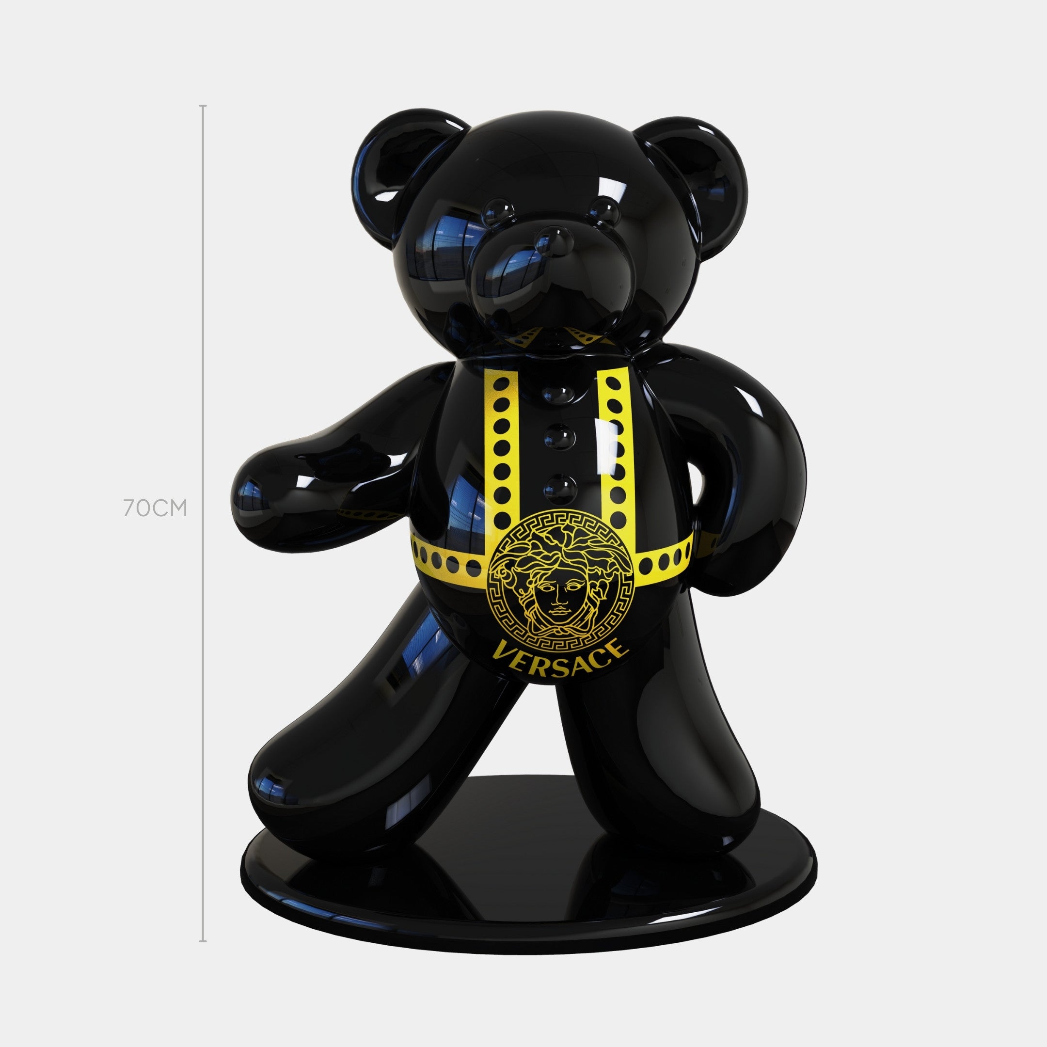 The Gacko Versace Bear Sculpture - 70cm by Giant Sculptures is a glossy black pop art piece with yellow and gold Versace details, including the Medusa logo. Displayed on a round base, it adds luxury style to your decor.