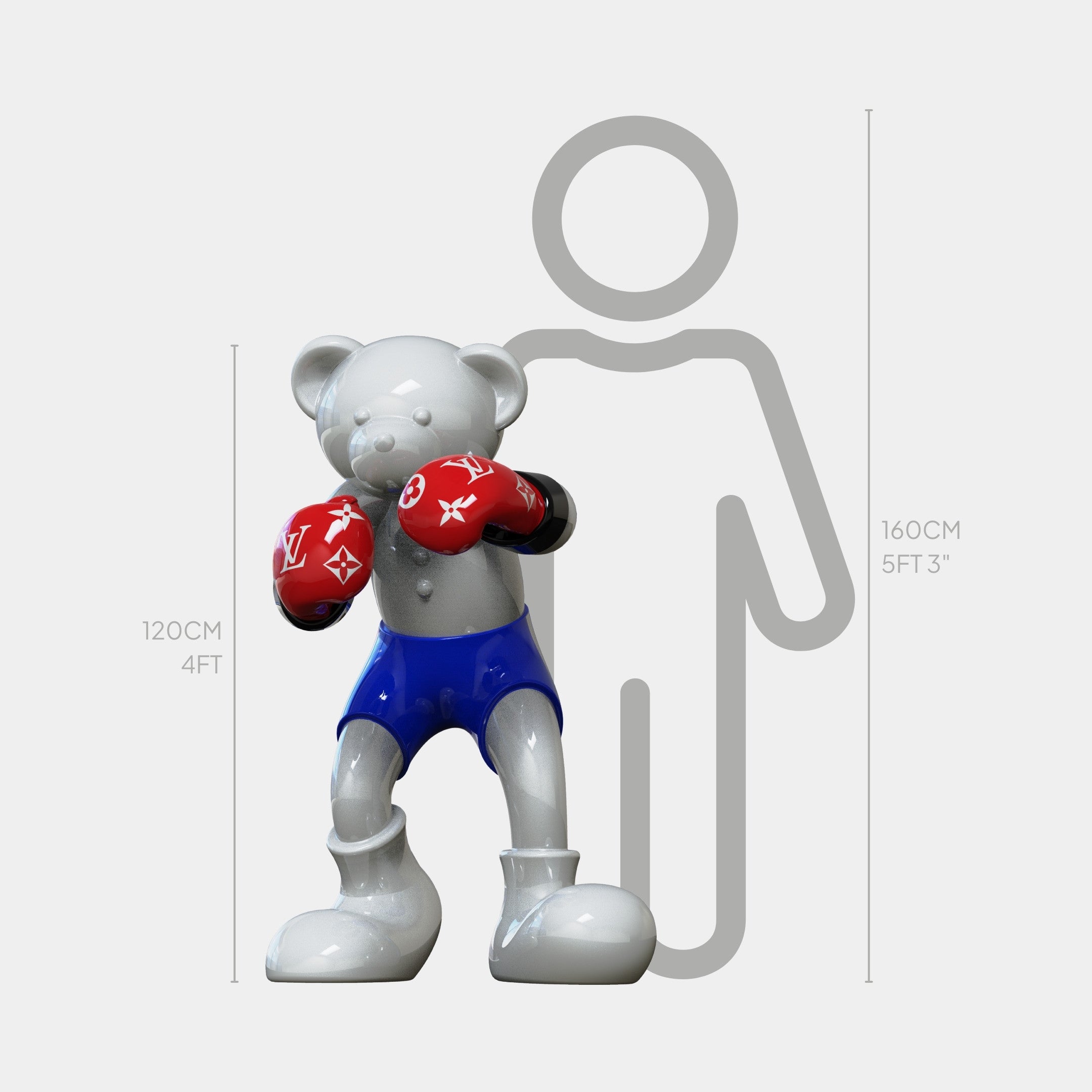 The Gacko Grey & Red LV Boxer Bear Sculpture by Giant Sculptures stands 120cm tall, featuring a shiny gray bear in red gloves and blue shorts before a 160cm gray human outline.