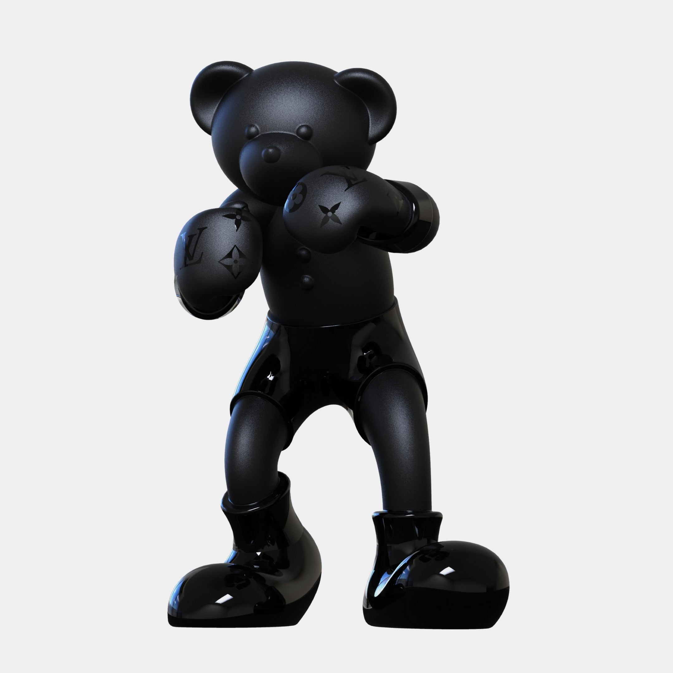The Gacko Black LV Boxer Bear Sculpture - 80cm by Giant Sculptures stands in a boxing pose with patterned gloves and shorts, featuring glossy black details against a plain white background. This is a limited edition art piece.