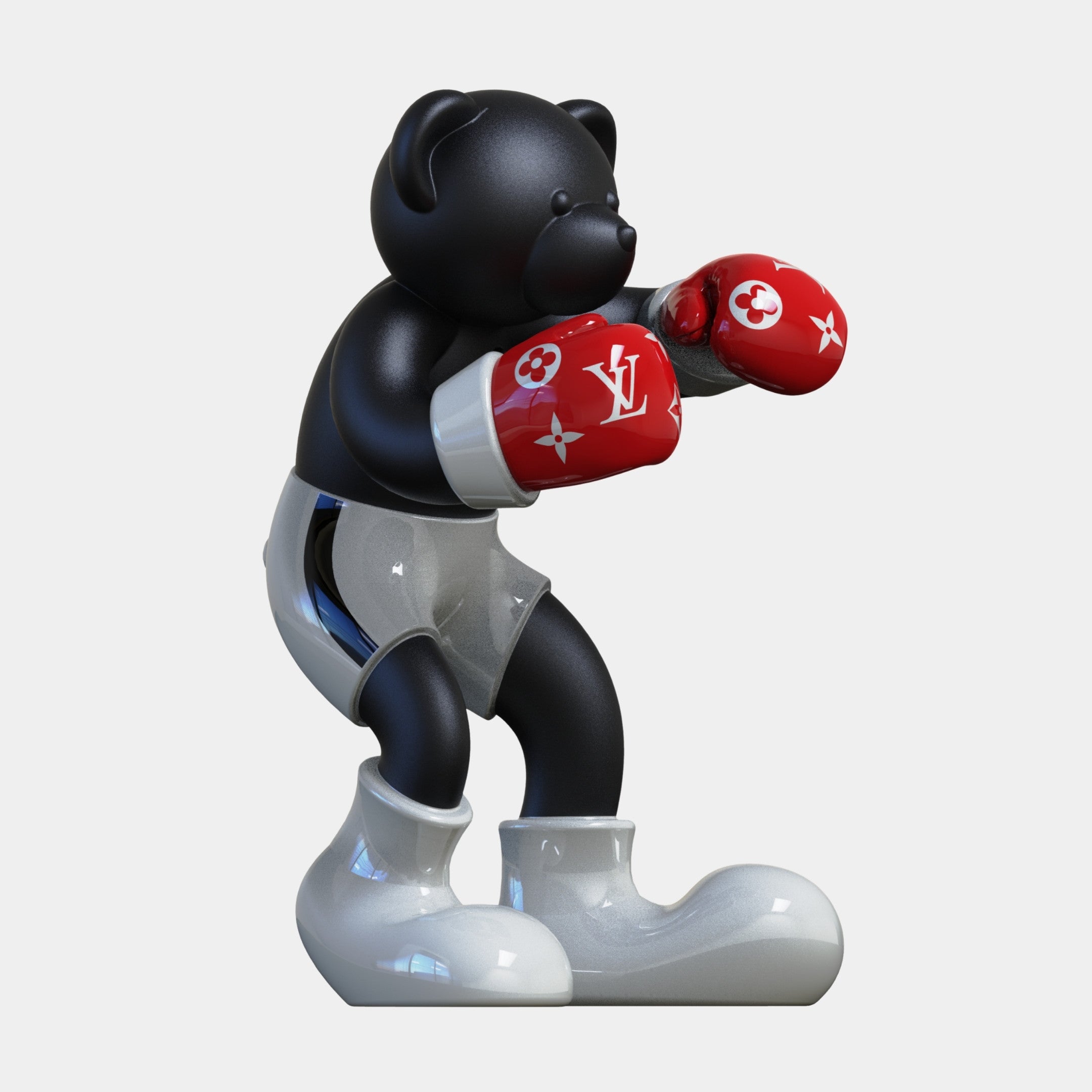 The Giant Sculptures Gacko Black & Red LV Boxer Bear Sculpture (200cm) features a black bear with silver shorts, oversized white boots, and red gloves with white Louis Vuitton logos, posed in a boxing stance—perfect pop art for any space.
