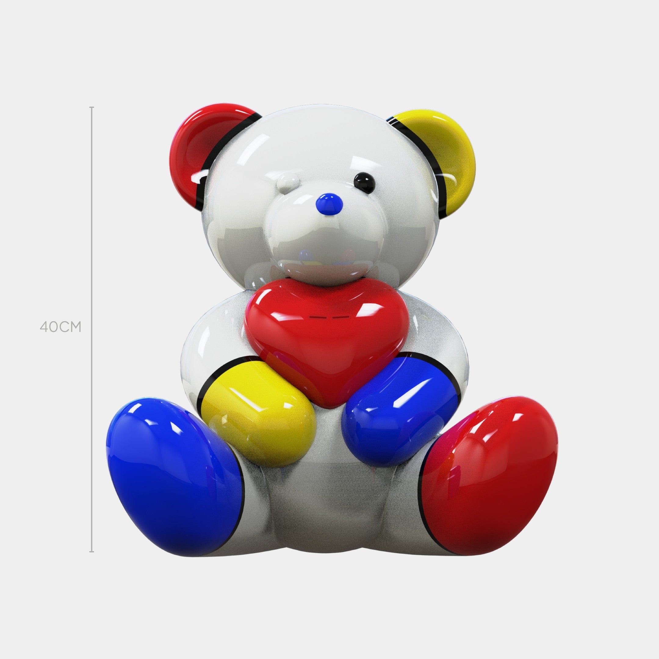 The Gacko Mondrian Love Bear Sculpture - 40cm by Giant Sculptures is a glossy, multicolored modernist bear with a white body, pop art red/yellow/blue accents on ears, hands, feet, and holding a red heart.