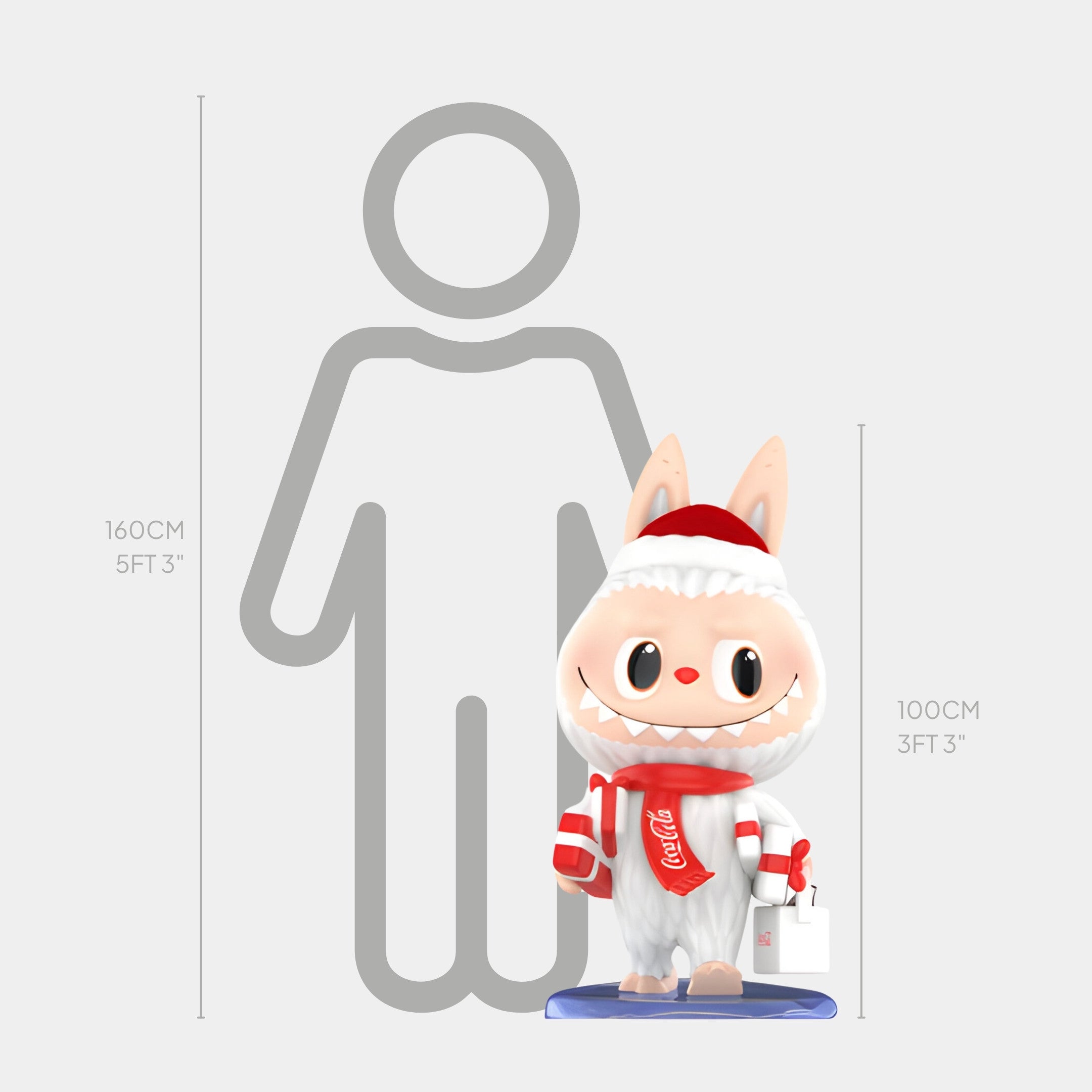 The Gift Delivery Coca-Cola Labubu Sculpture - 100cm by Giant Sculptures is a charming piece in a festive winter outfit, shown beside a height chart to emphasize its 100 cm size—much shorter than the adjacent 160 cm human outline.