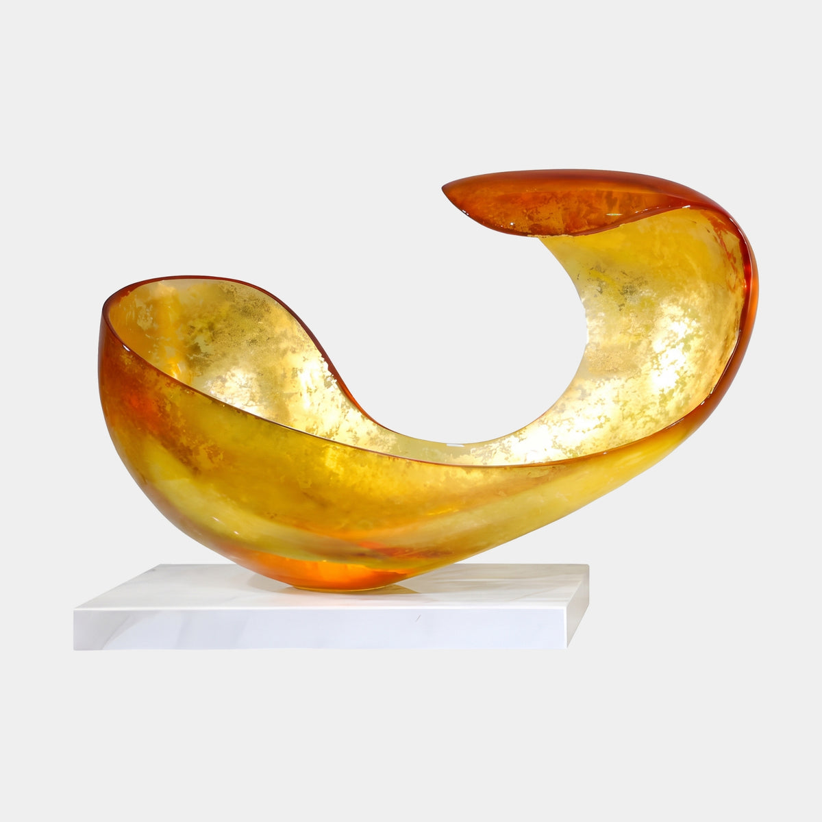 Amber & Gold Scroll Shell Resin Sculpture, 85cm, curled shell-like form with gold-flecked interior and translucent amber exterior, on a white marble base against a plain background.