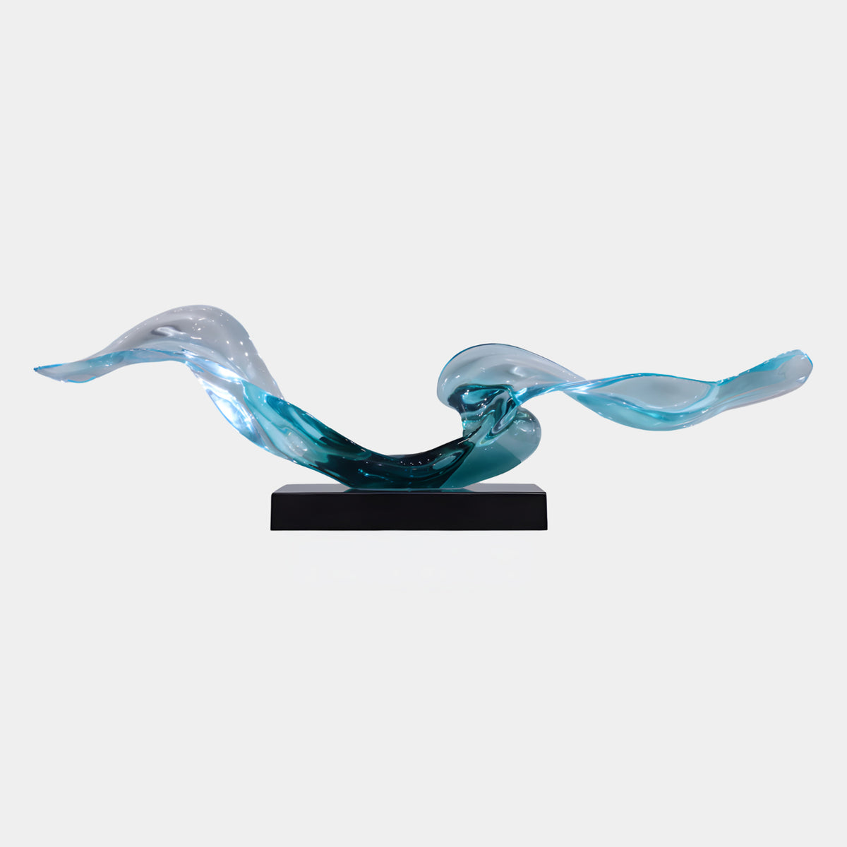 Teal & Clear Double Wave Ribbon Resin Sculpture, 128cm, with a curling ribbon form deepening to petrol teal, set on a black rectangular base against a plain white background.