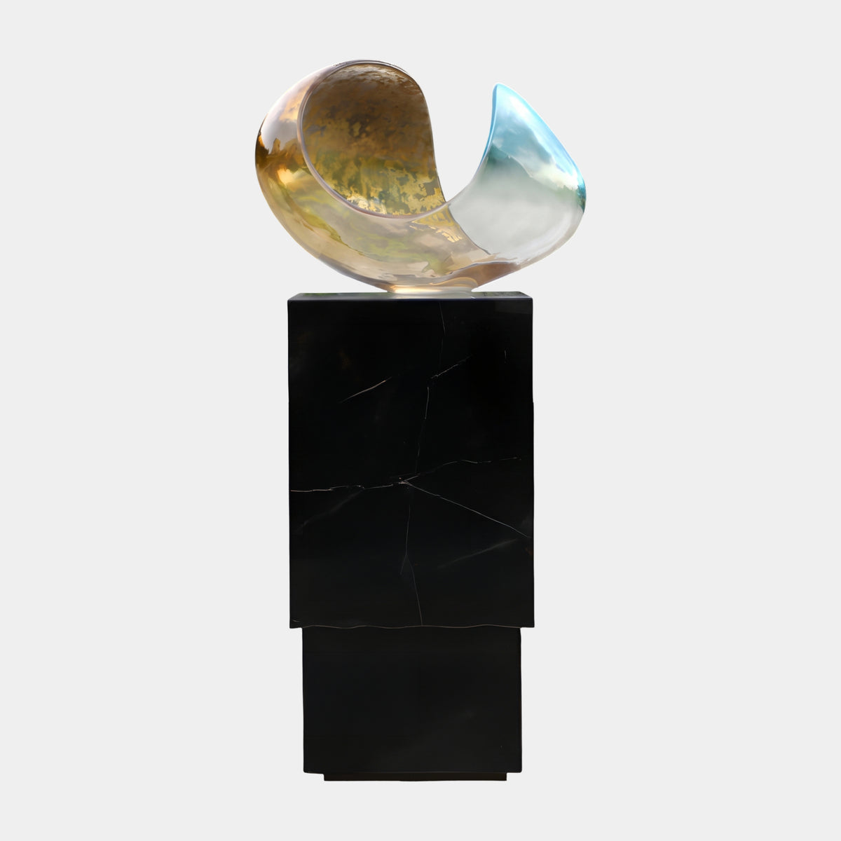 Antiqued Gold Leaf Folded Curl Resin Sculpture, 120cm, curled resin form with aged gold leaf interior and clear lip on a black marble column, plain white background.