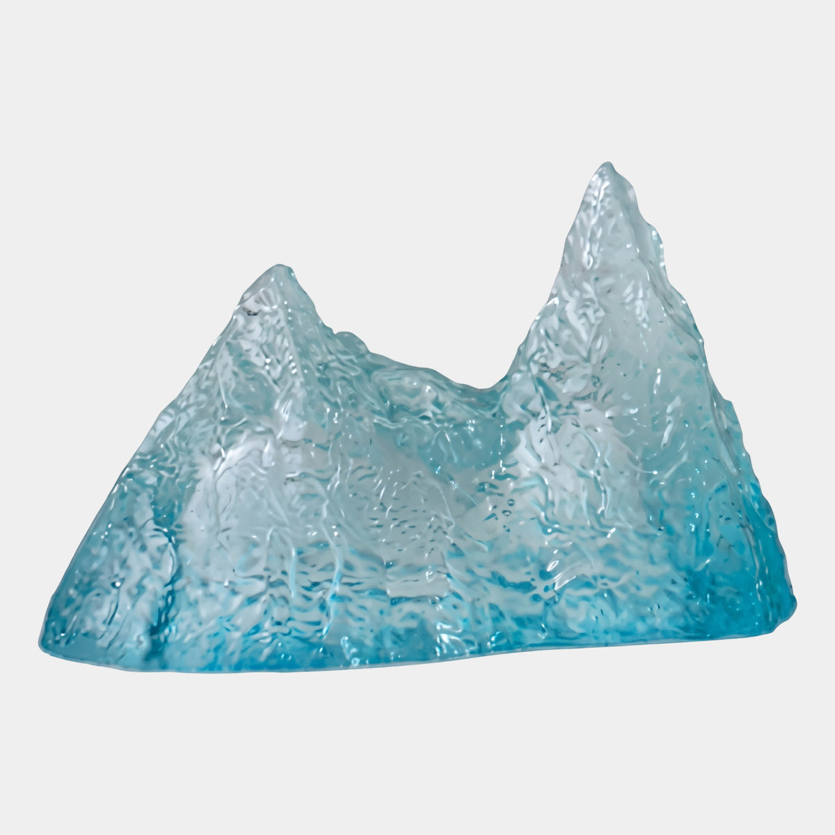 Aqua & Frosted Twin Spire Resin Sculpture, 30cm, twin-peaked mountain form with icy white summits fading to aqua blue at the base, on a plain white background.