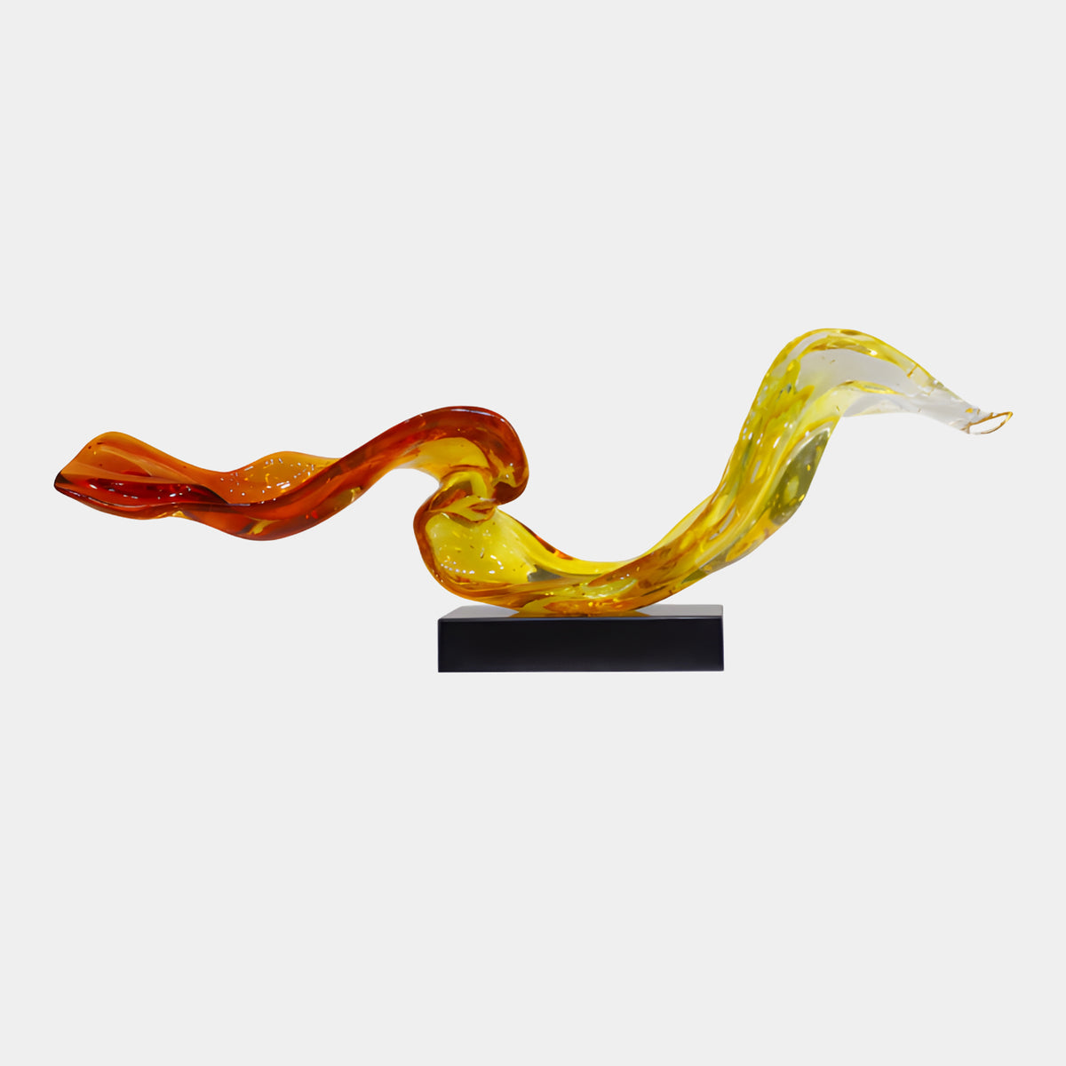Amber Red Graded Ribbon on Marble Resin Sculpture, 110cm, a wavy resin ribbon shifting from red to amber to yellow on a black marble base, shown on a plain light background.