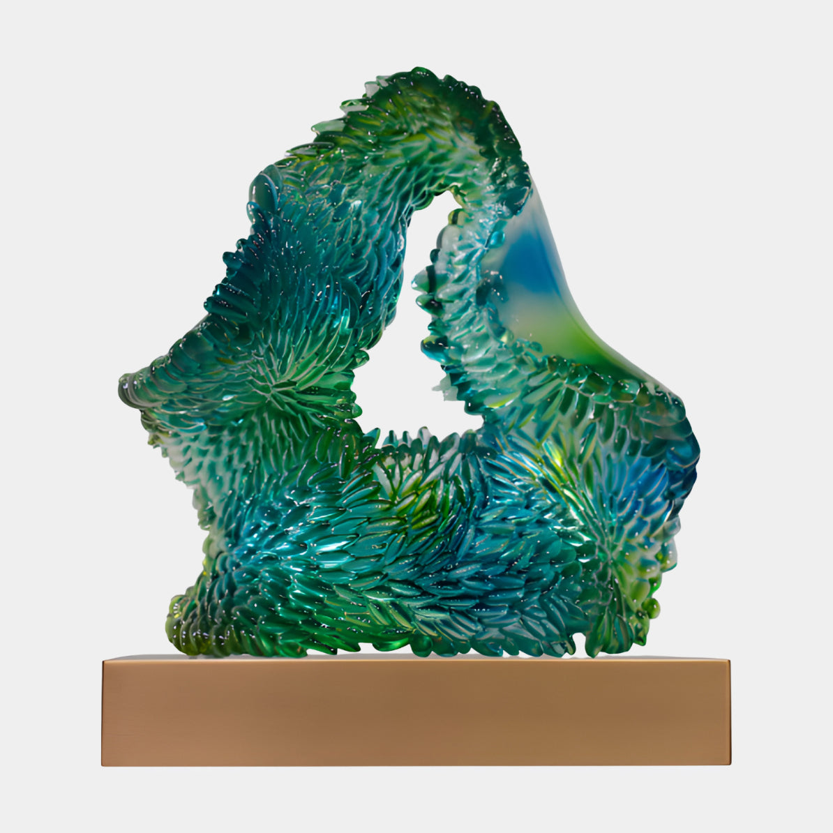 Green & Blue Scaled Loop Resin & Steel Sculpture - 69cm, a looped resin form with petal-like scales in green and teal, one smooth blue-green face, on a bronze steel block against a plain white background.
