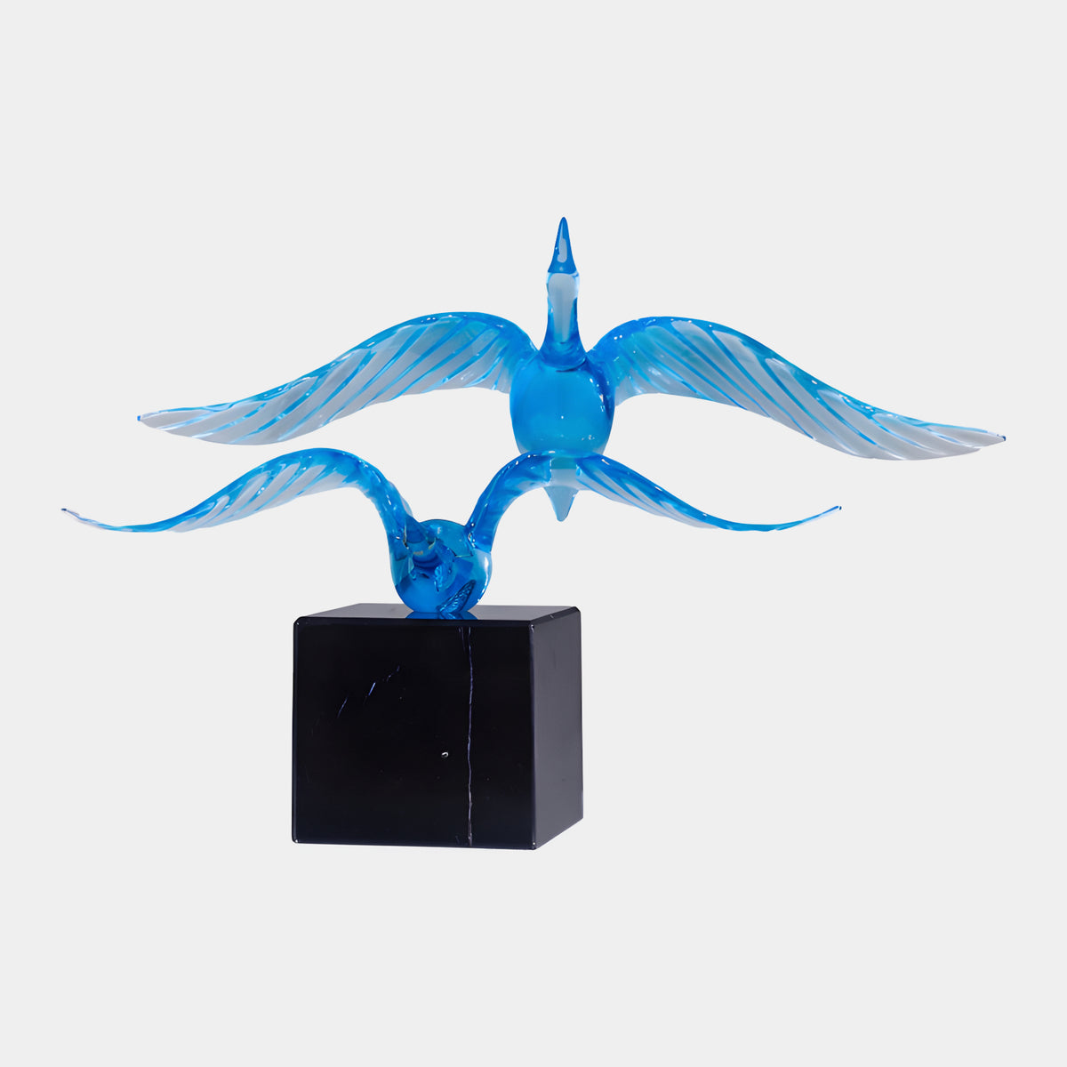 Blue Spread Wing Twin Bird Resin Sculpture, 75cm, two blue resin birds with fully spread, feather-combed wings on a black marble block, shown against a plain white background.