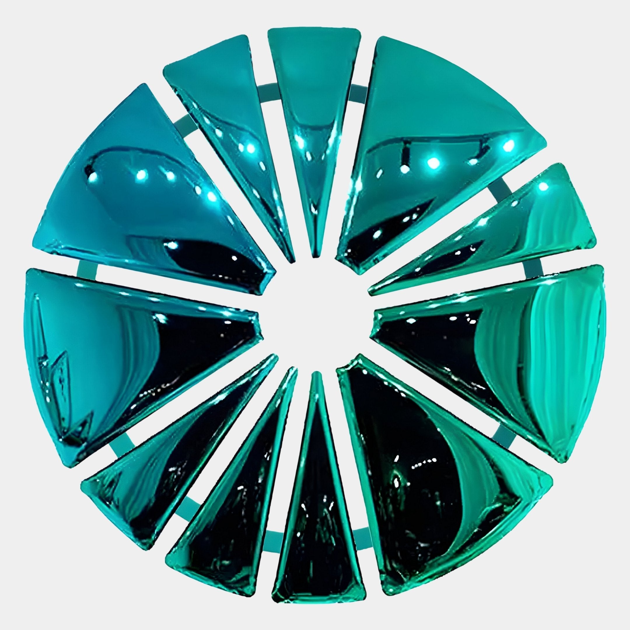 The Halo Teal Segment Circle 3D Metal Wall Art by Giant Sculptures features glossy teal triangular pieces with spaces between them, creating a modern abstract sunburst look—an eye-catching contemporary wall decor.