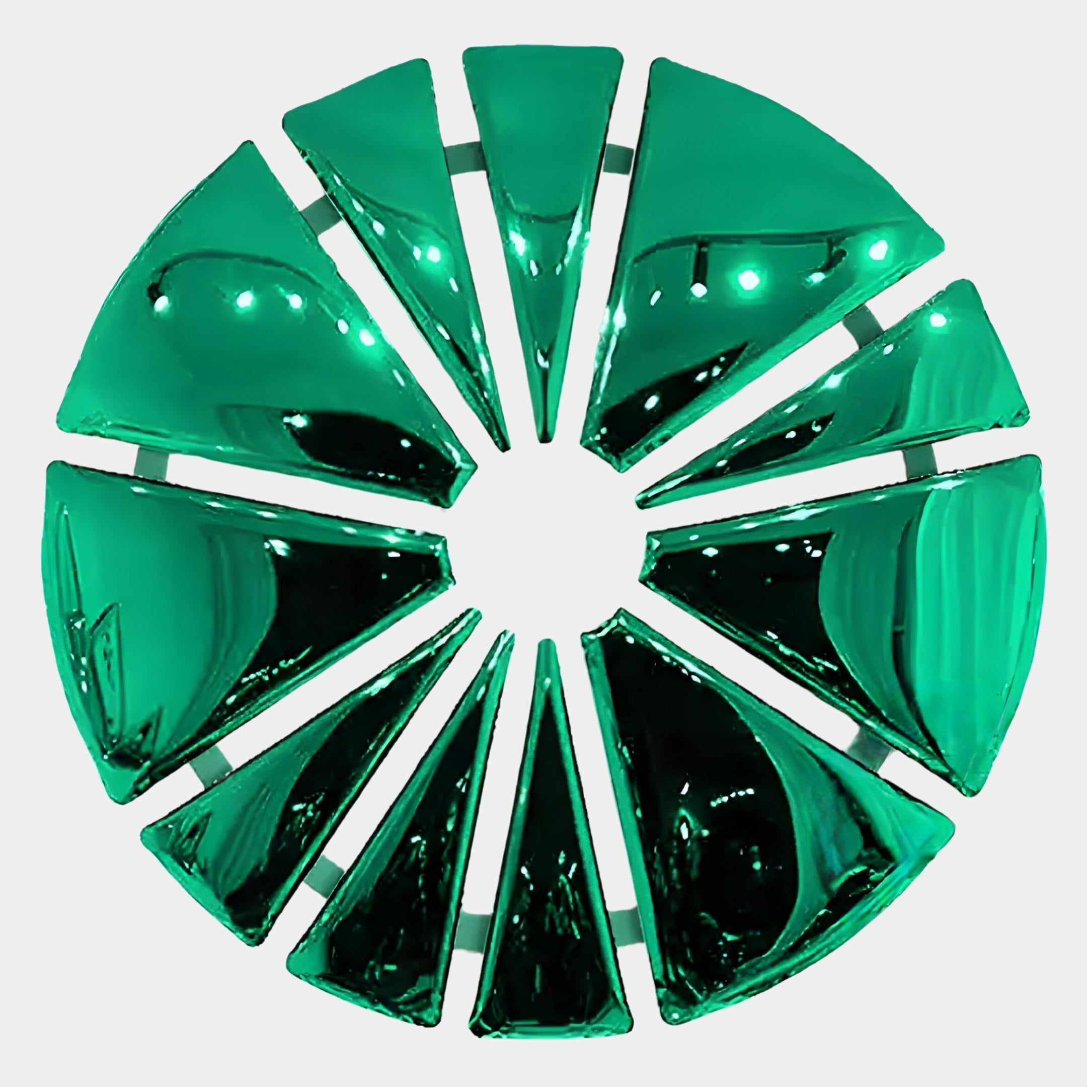 The Halo Emerald Segment Circle 3D Metal Wall Art from Giant Sculptures features shiny, emerald-green triangular segments arranged in a modern circular design with an open center, displayed on a white background.