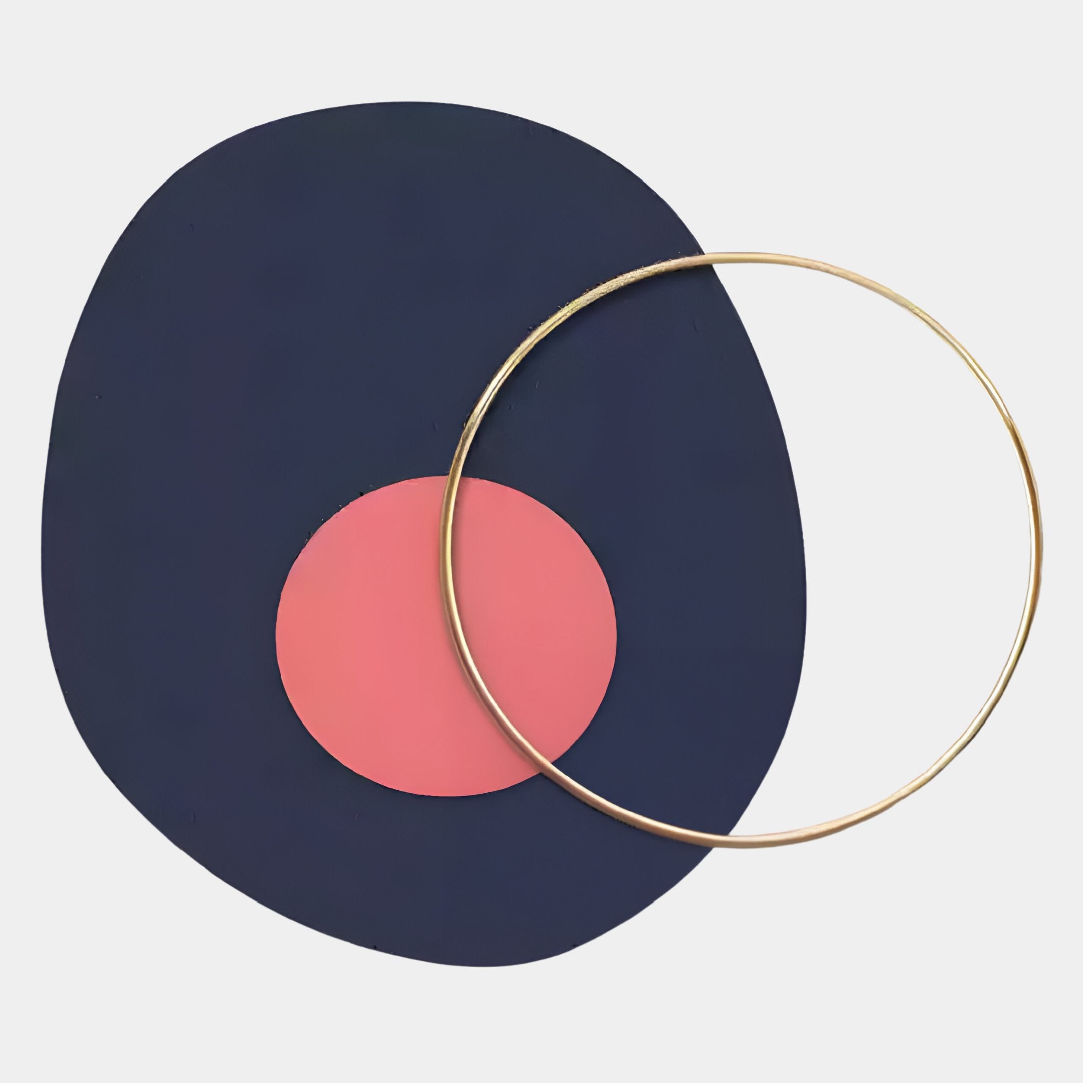 The Solaro Bold Navy & Coral Round Mural Wall Art by Giant Sculptures features a striking navy oval with a pink circle and a slim gold ring on white—perfect for Nordic-inspired, minimalist décor.